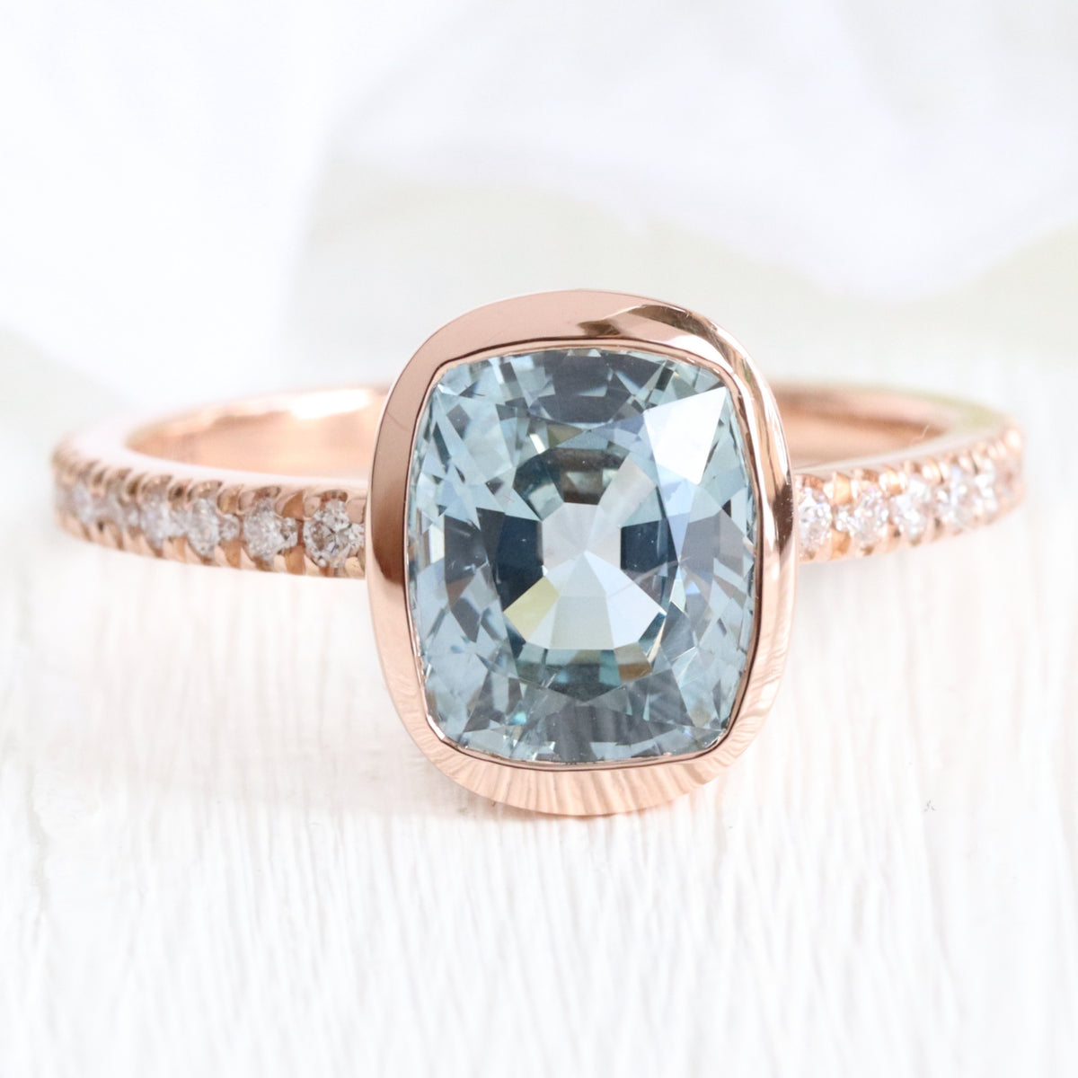 Cushion aqua blue sapphire ring rose gold bezel solitaire pave diamond band la more design jewelry