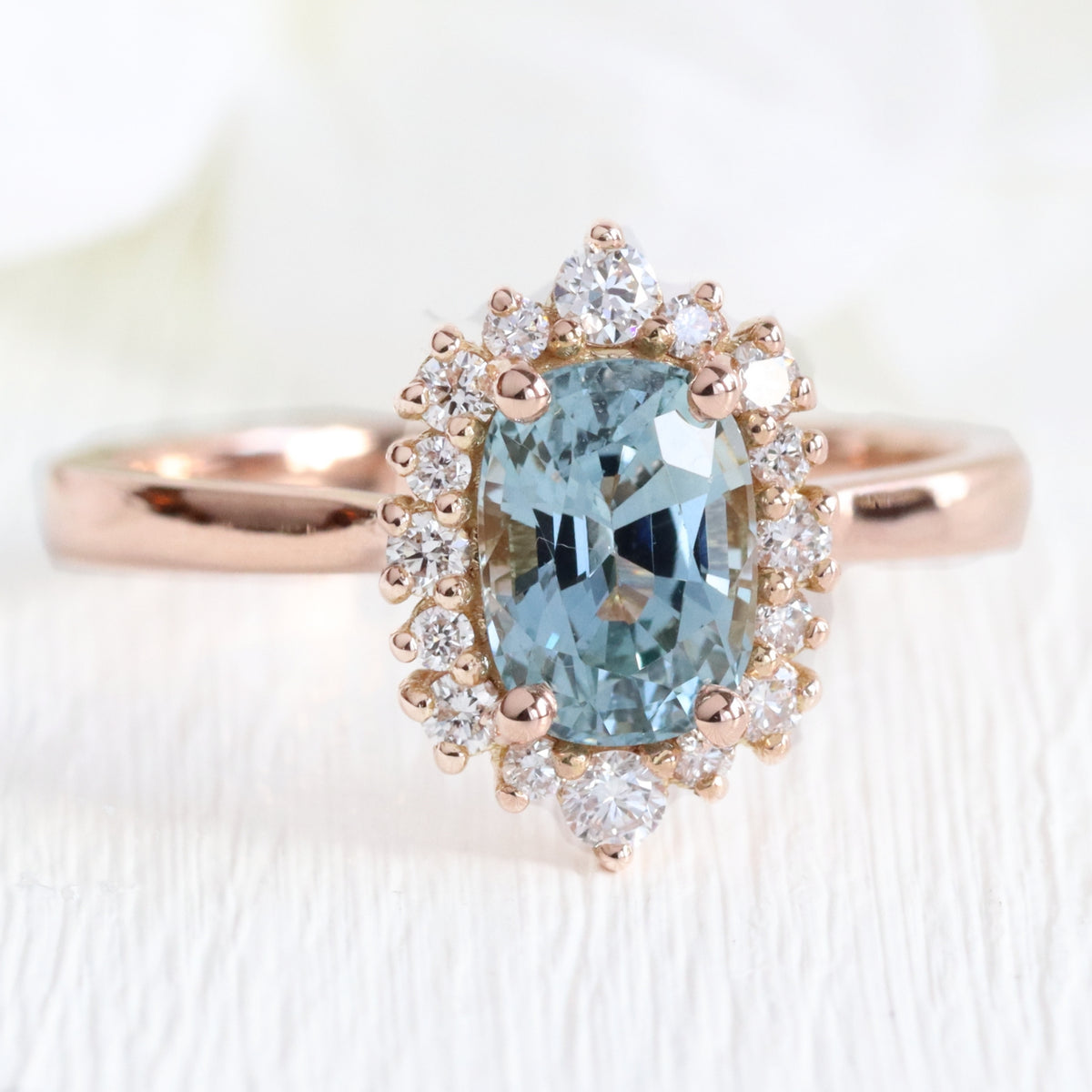Cushion aqua blue sapphire ring rose gold halo diamond sapphire engagement ring la more design jewelry