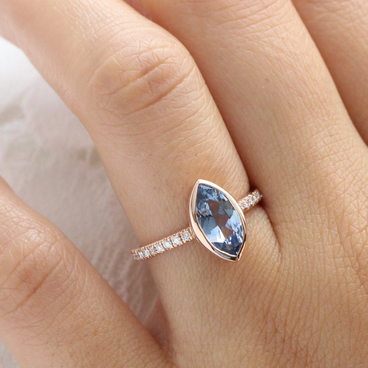 Marquise teal blue sapphire ring rose gold bezel solitaire pave diamond band la more design jewelry