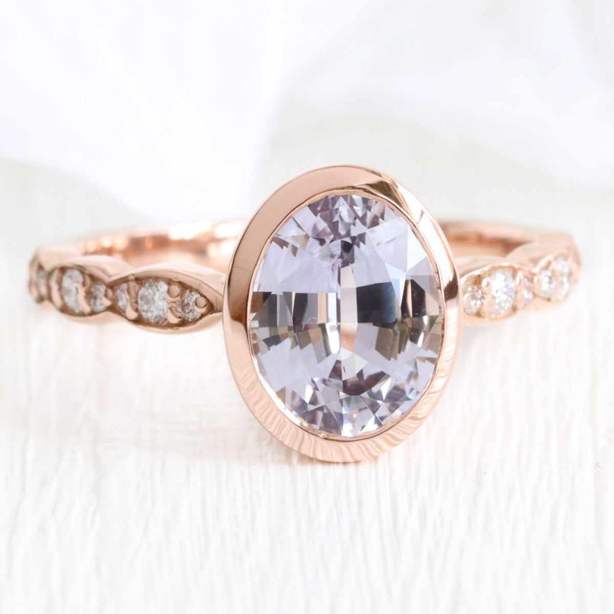 Oval lavender sapphire ring rose gold bezel solitaire scalloped diamond band la more design jewelry