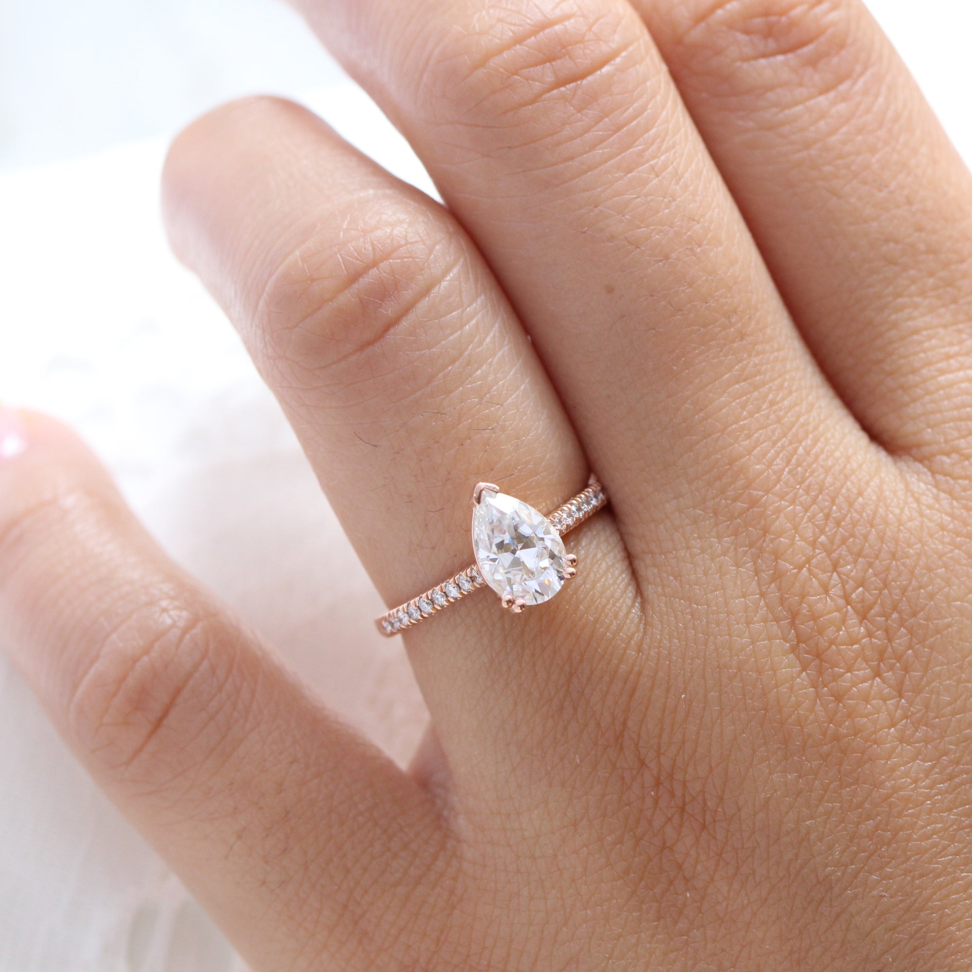 Pear Moissanite Solitaire Ring 14k Rose Gold Pave Diamond Band