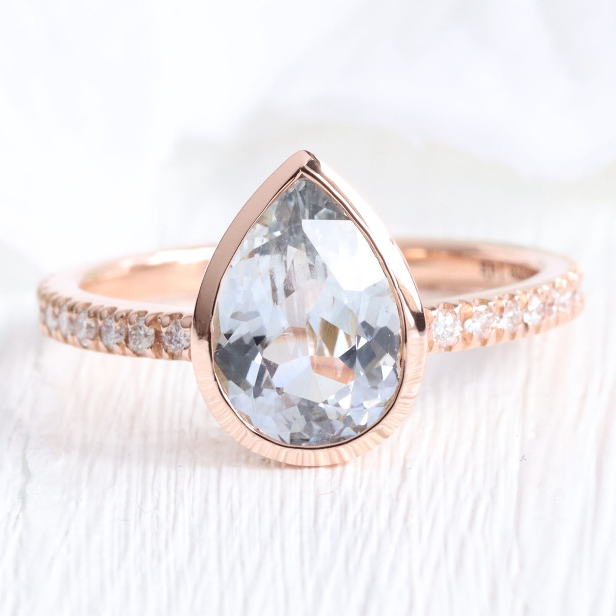 Pear aqua blue sapphire ring rose gold bezel solitaire pave diamond band la more design jewelry