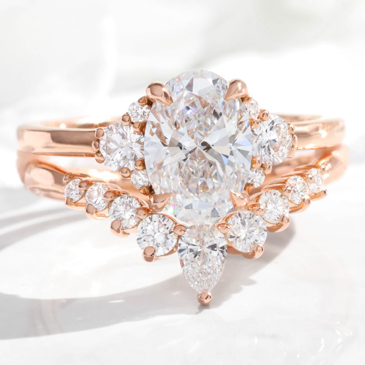 large oval lab diamond 3 stone ring bridal set rose gold V shaped diamond ring stack la more design jewelry