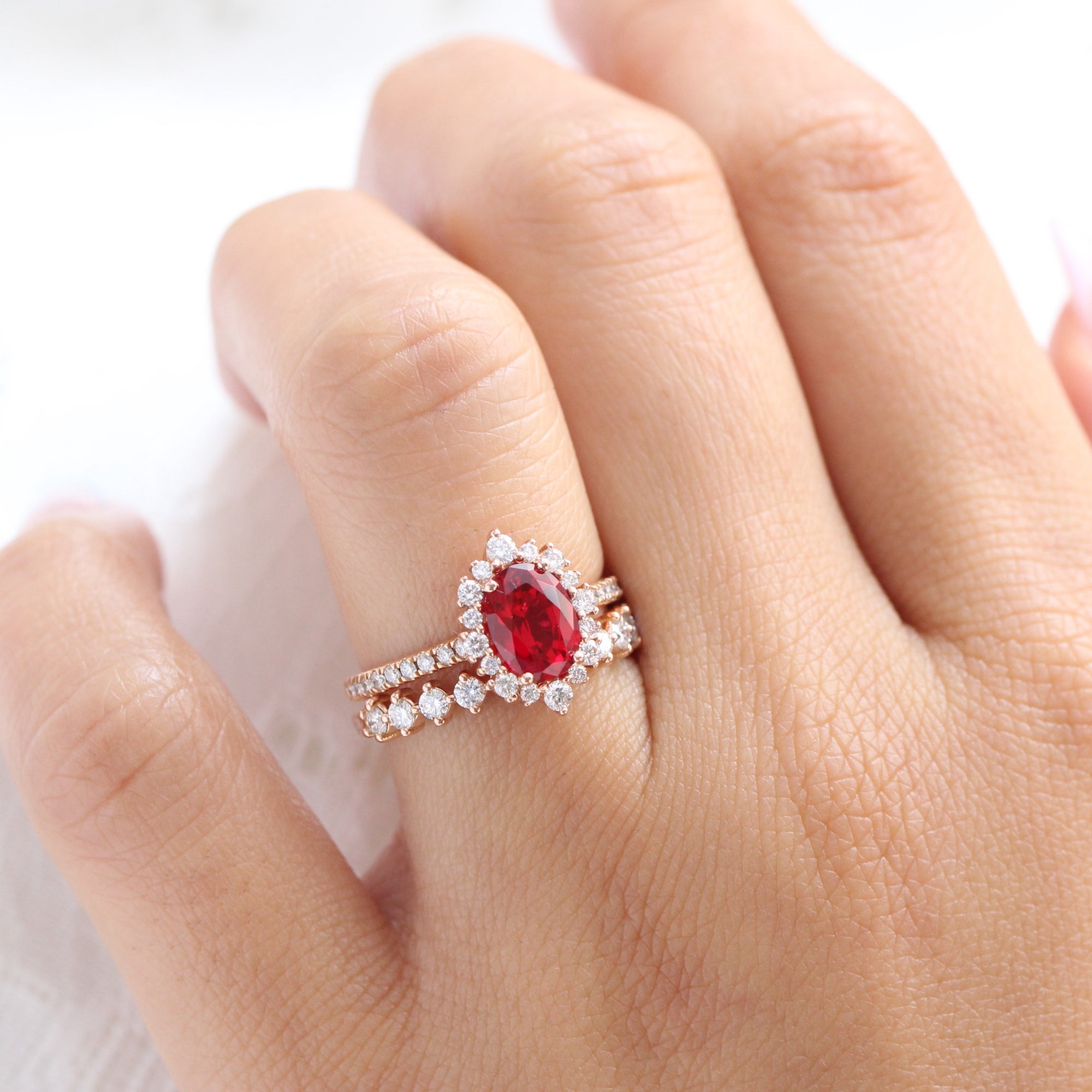 Halo diamond oval ruby ring stack rose gold eternity diamond wedding band la more design jewelry