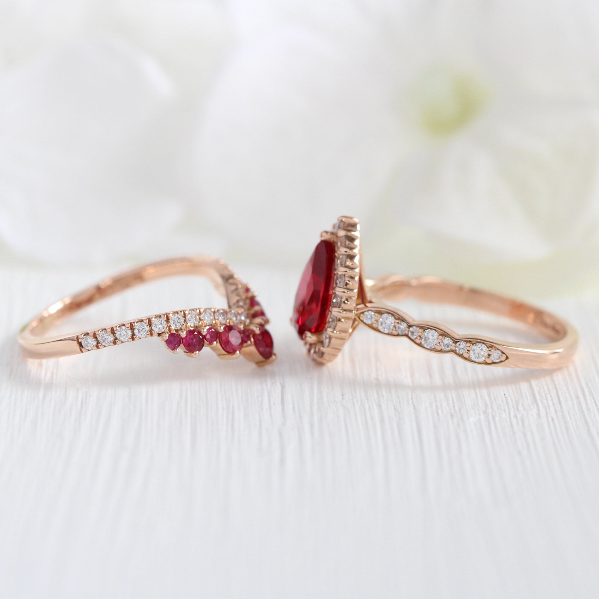 Halo diamond pear ruby ring stack rose gold deep curved wedding band bridal set la more design jewelry