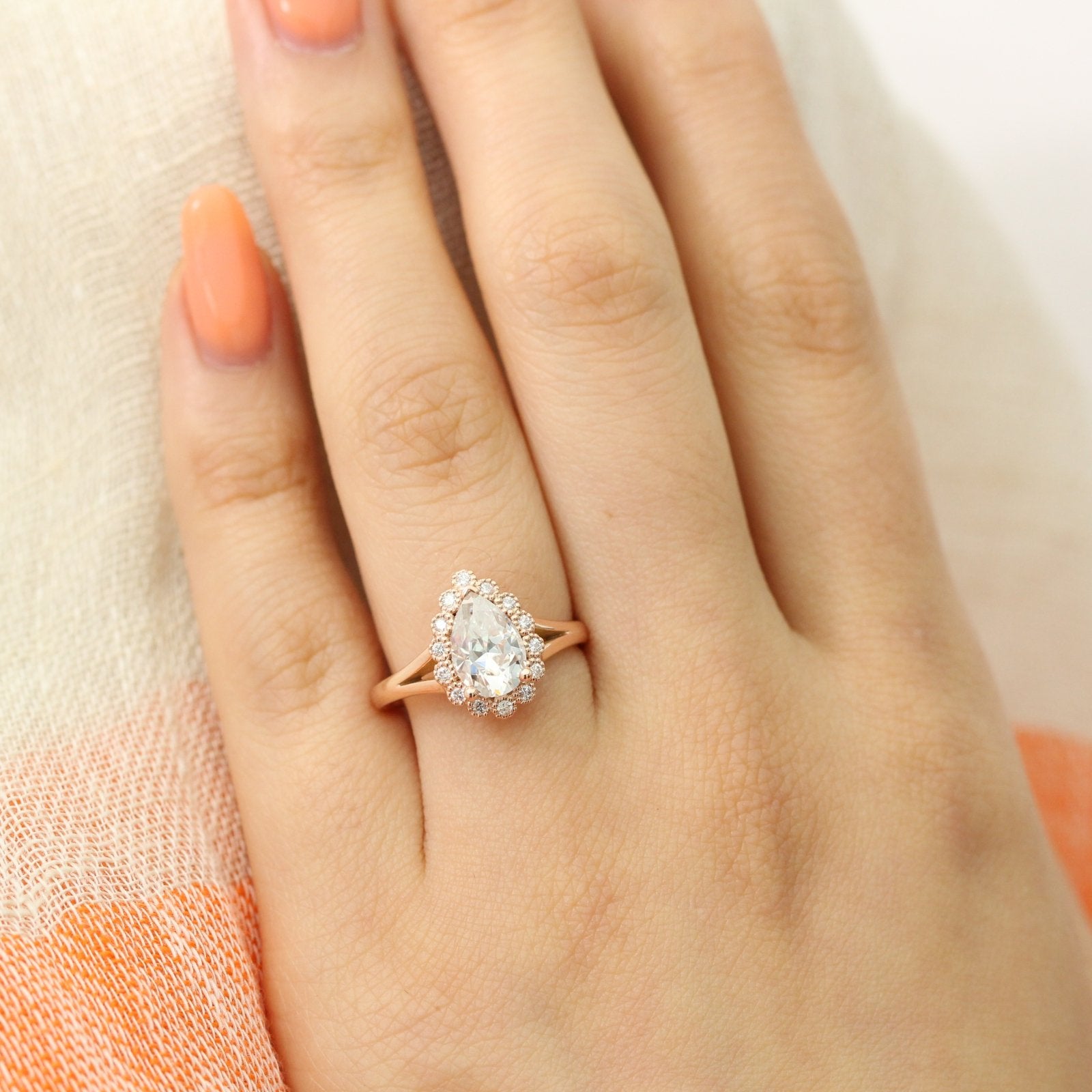 Pear forever one moissanite ring in rose gold vintage halo diamond band by la more design