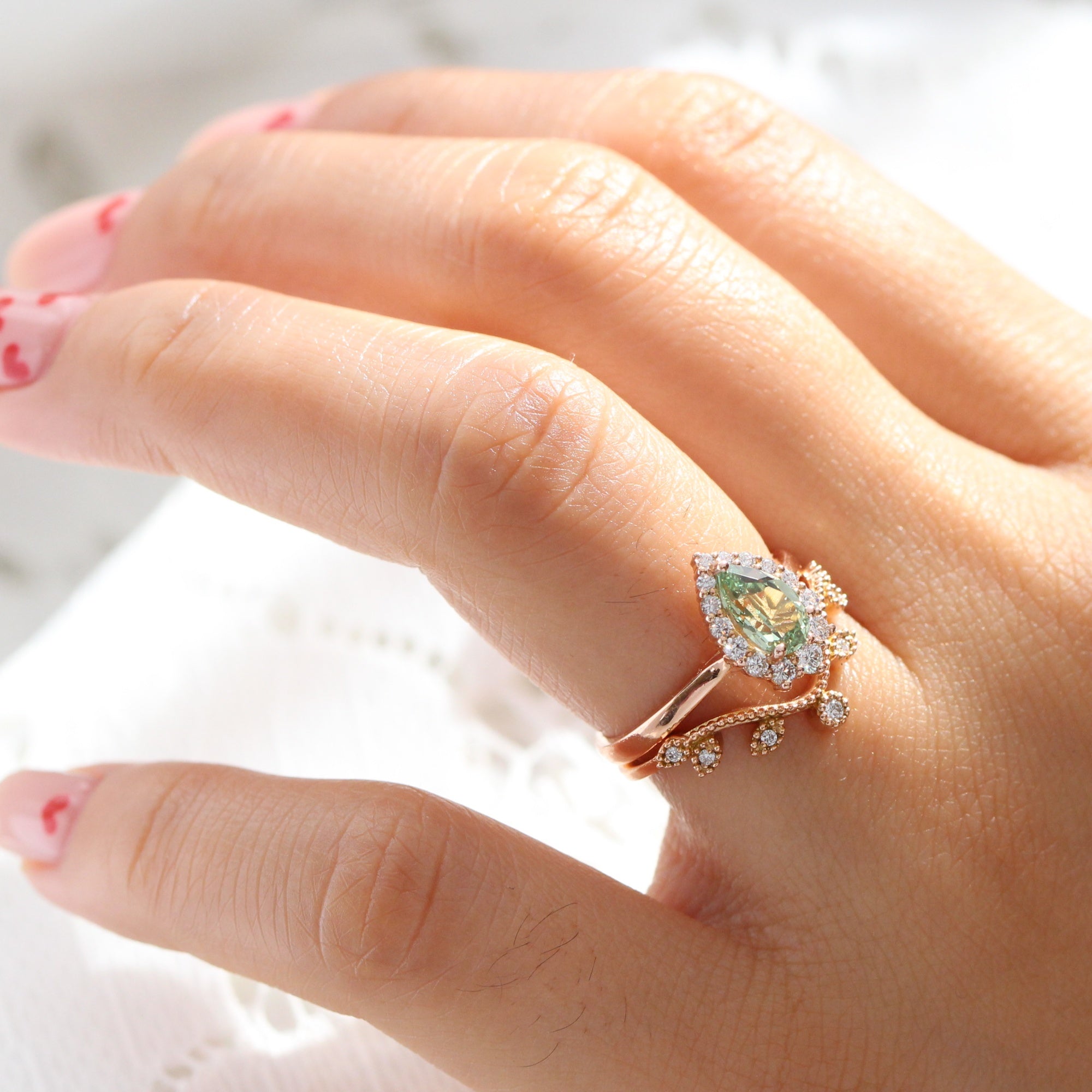 Pear green sapphire ring rose gold curved leaf diamond wedding band la more design jewelry