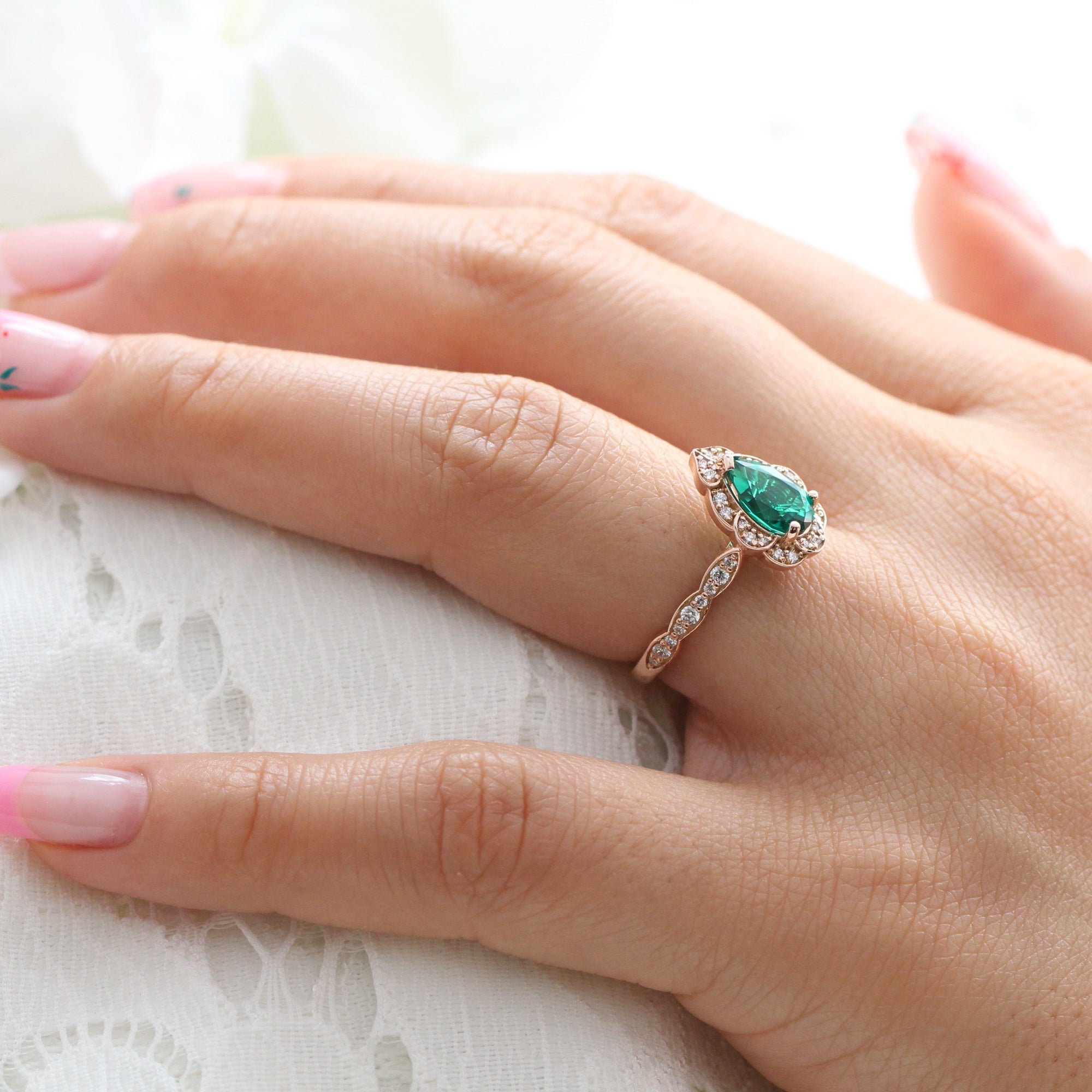 Pear shaped emerald ring rose gold clearance