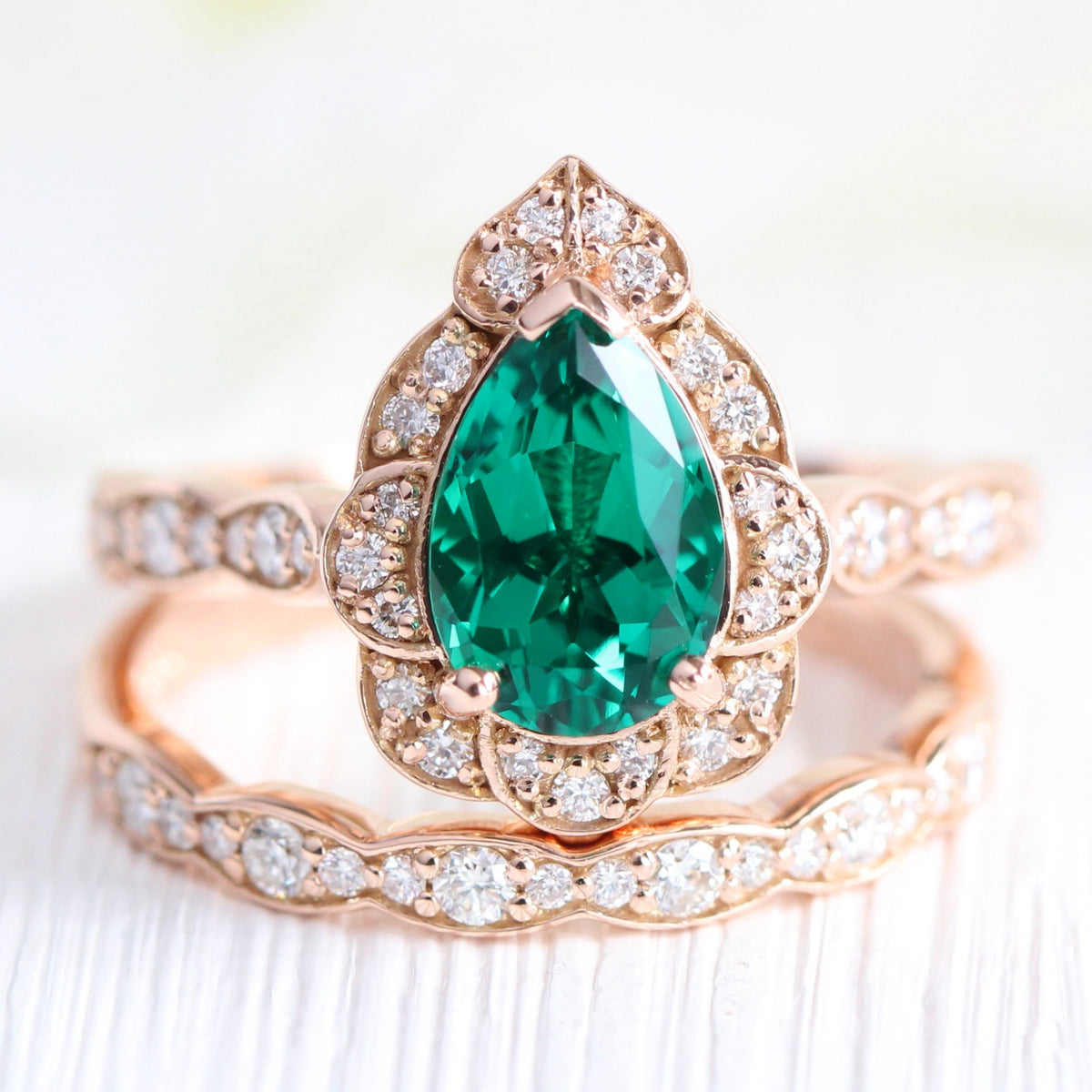 Vintage halo pear emerald ring stack rose gold matching diamond wedding band la more design jewelry