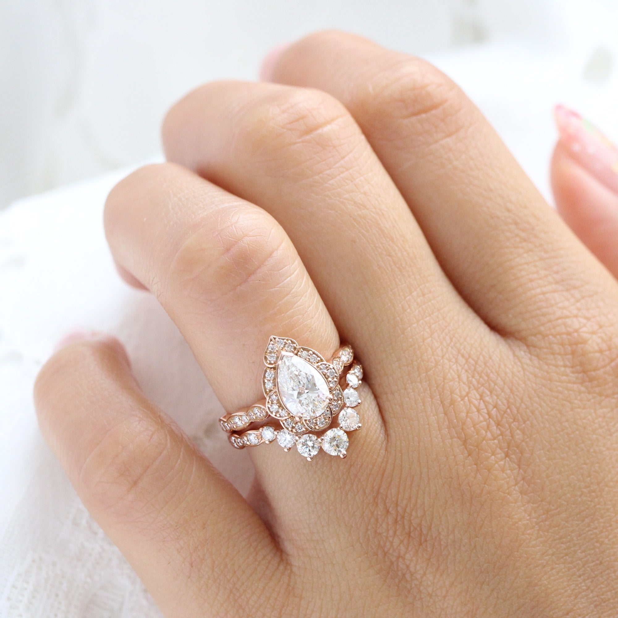 Gold band pear store diamond engagement ring