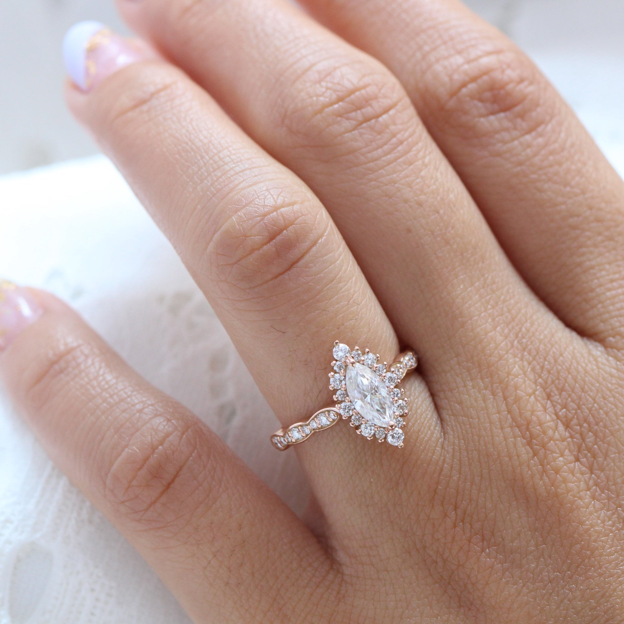 marquise moissanite engagement ring rose gold halo diamond scalloped band la more design jewelry