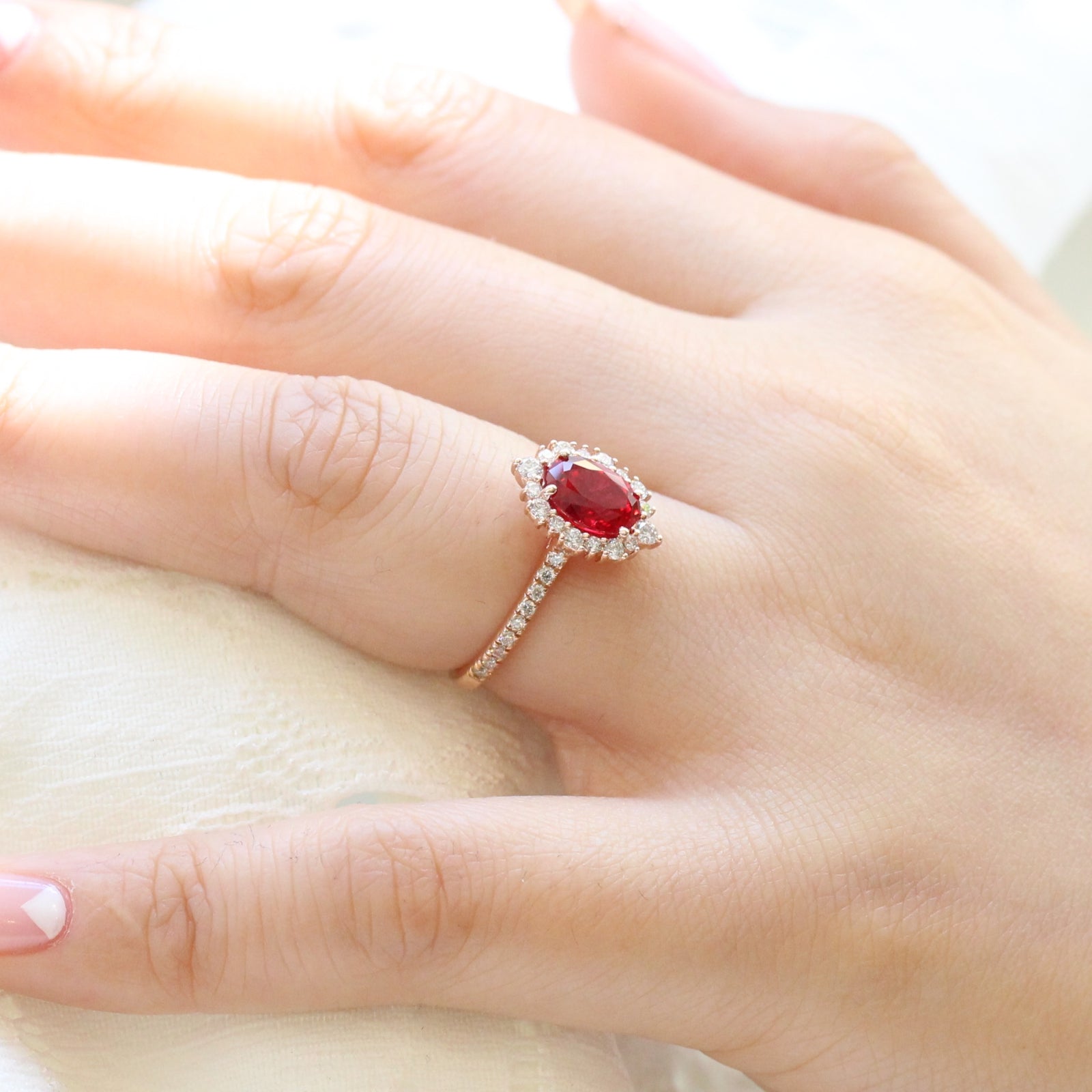 oval ruby engagement ring rose gold halo diamond ring low profile ring by la more design jewelry