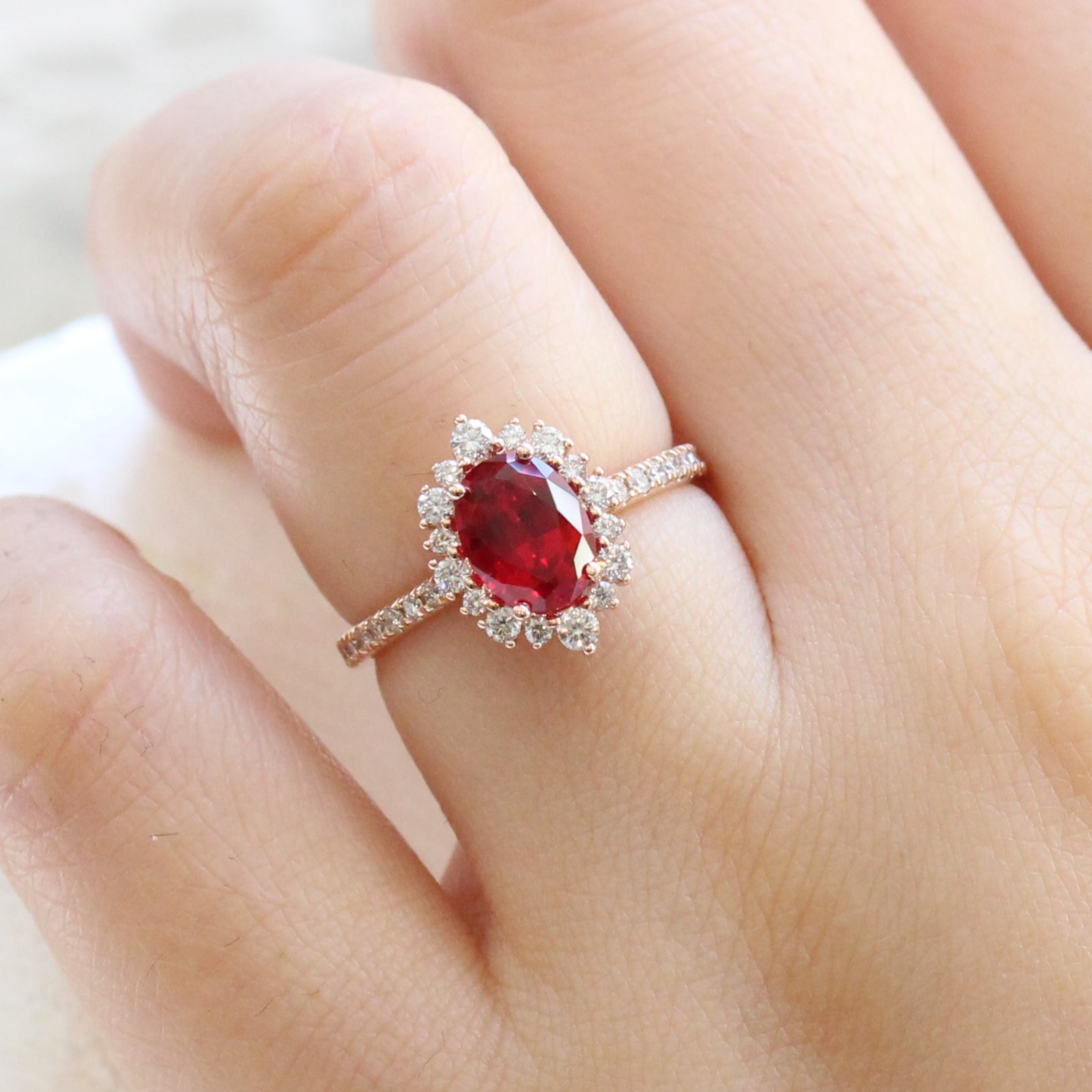 oval ruby engagement ring rose gold halo diamond ring low profile ring by la more design jewelry