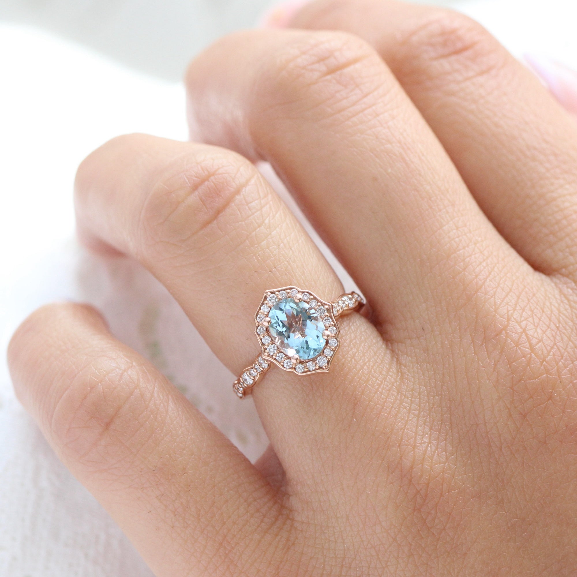 Oval Aquamarine Engagement Ring in Rose Gold Diamond Floral Band