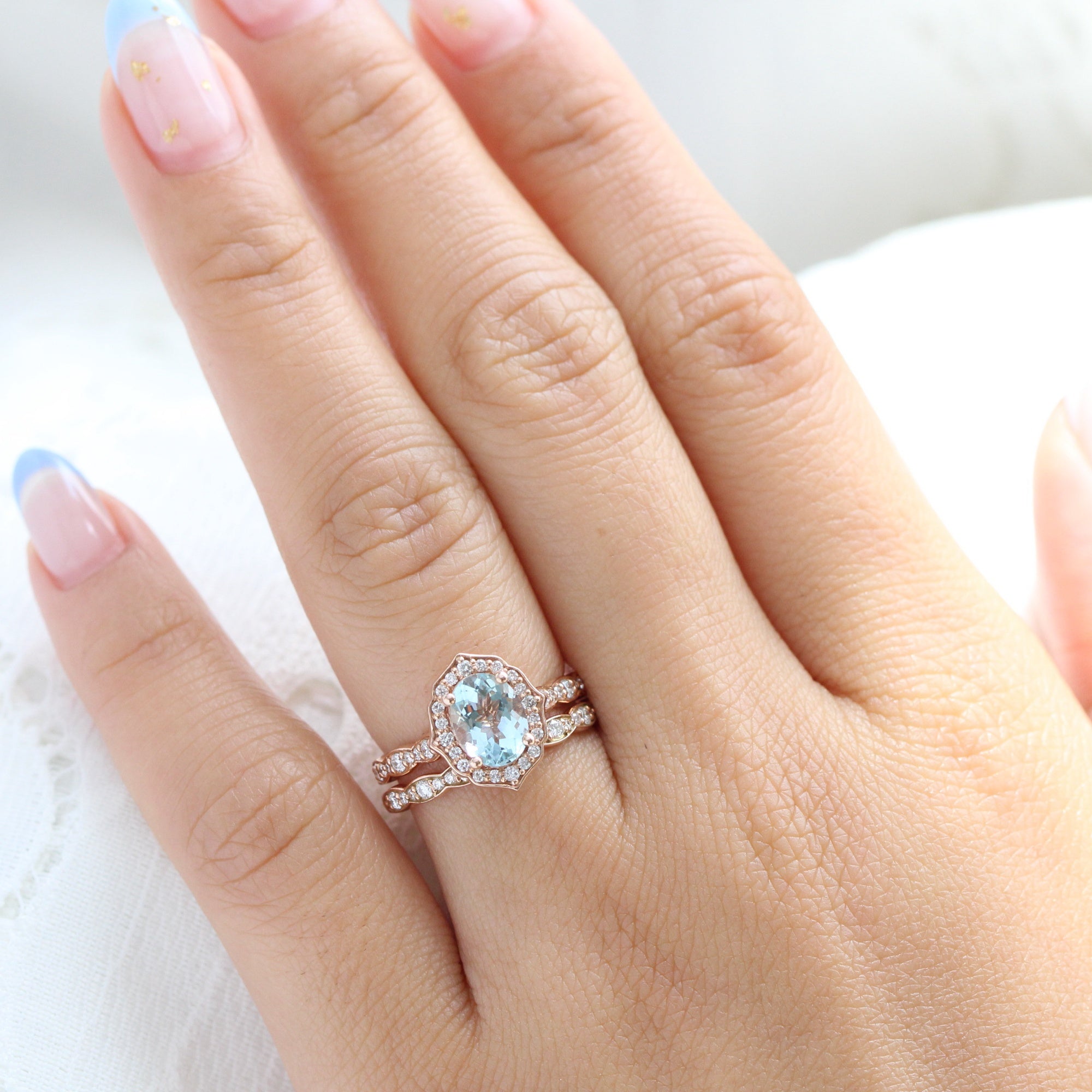 Rose Gold Oval Aquamarine Bridal Ring Set in Floral Diamond Band