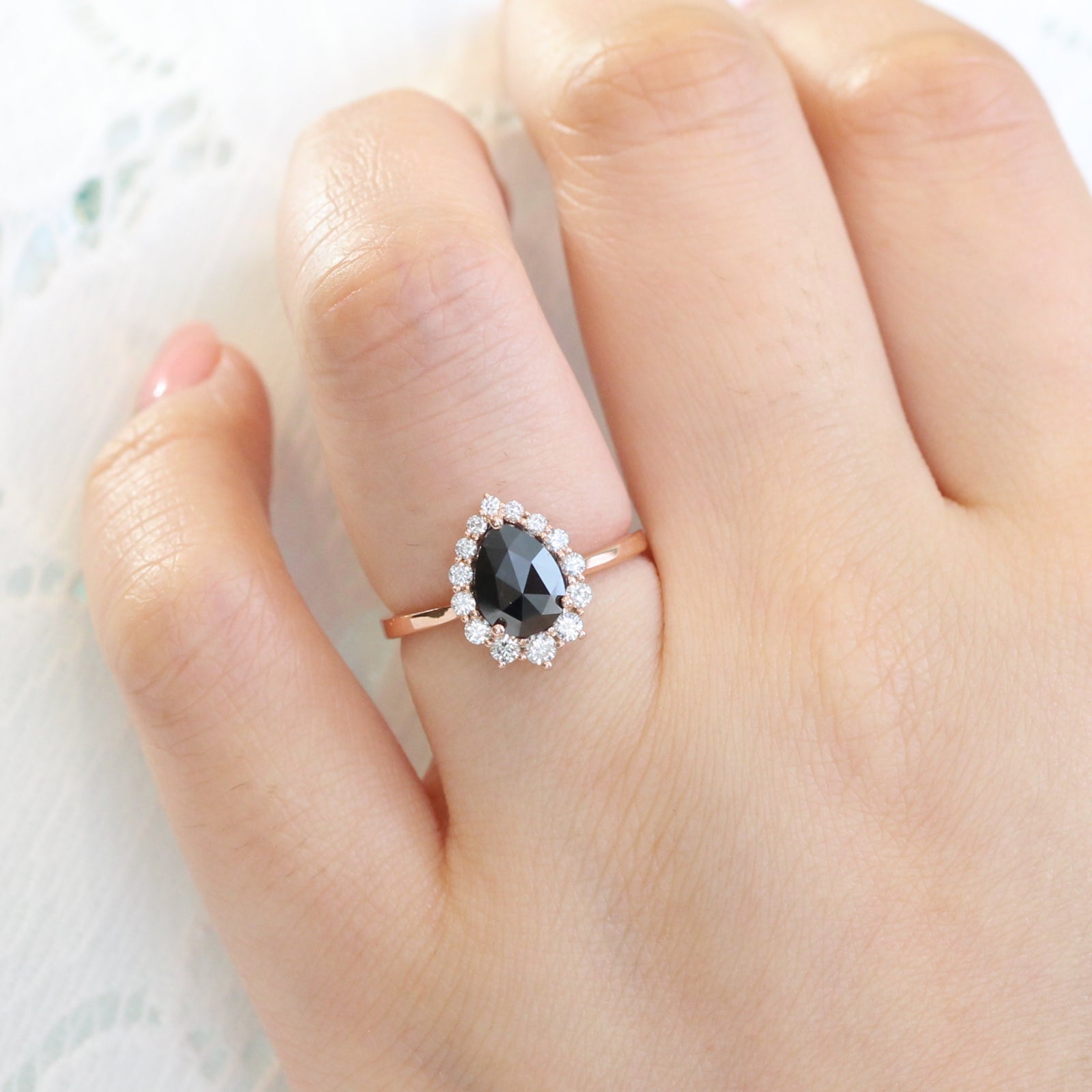 pear rose cut black diamond engagement ring in rose gold halo diamond by la more design