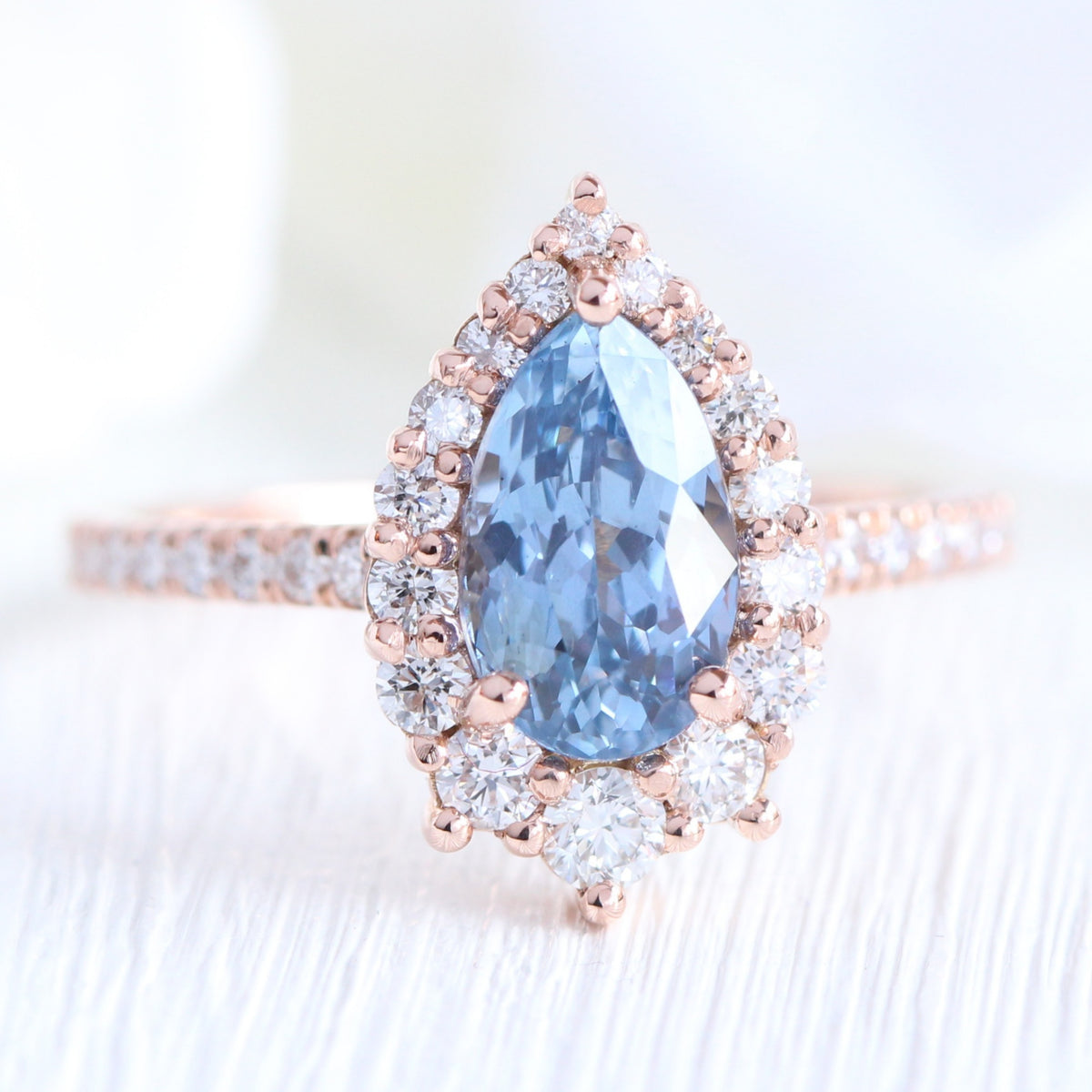pear blue sapphire ring rose gold halo diamond ring pave diamond band la more design jewelry