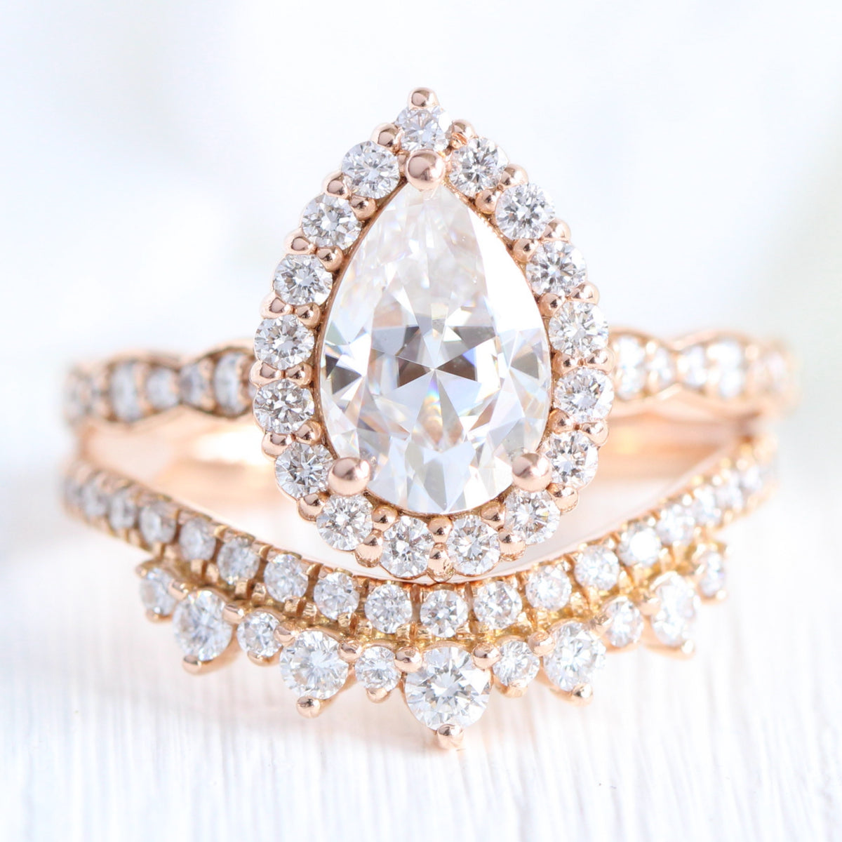 pear moissanite ring stack rose gold crown diamond wedding band bridal set la more design jewelry