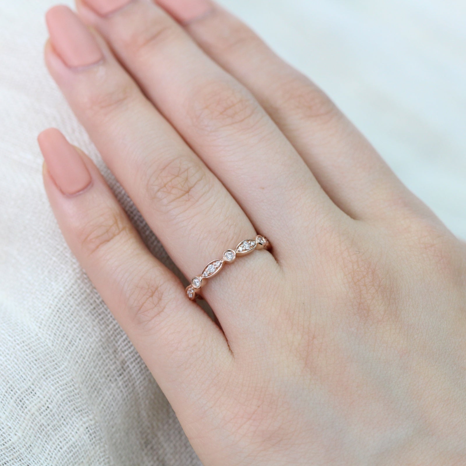 Rose Gold Bezel Diamond Wedding Ring in Half Eternity Diamond Band