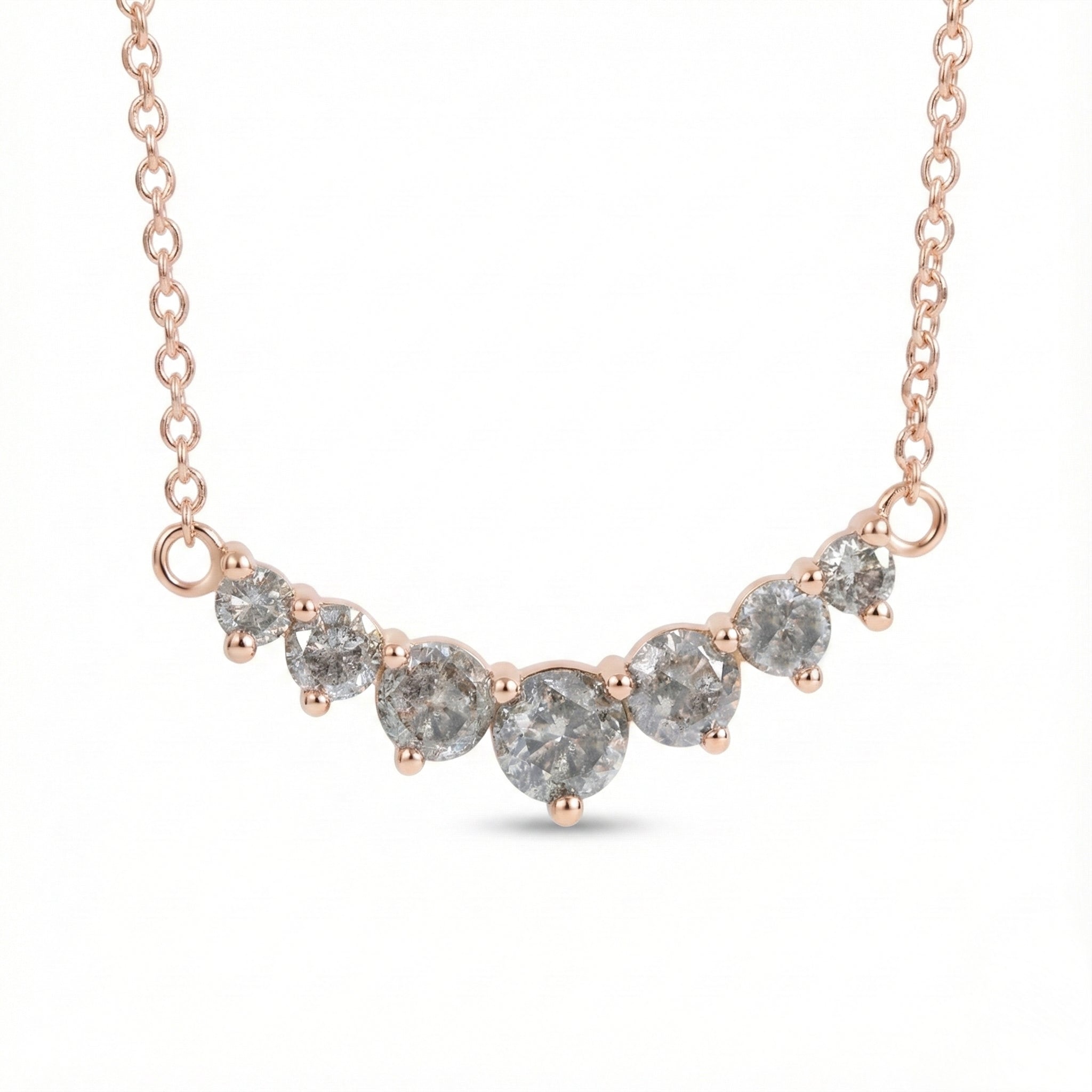 14k rose gold salt and pepper diamond necklace in a curved 7 stone setting pendant with natural grey diamonds la more design jewelry