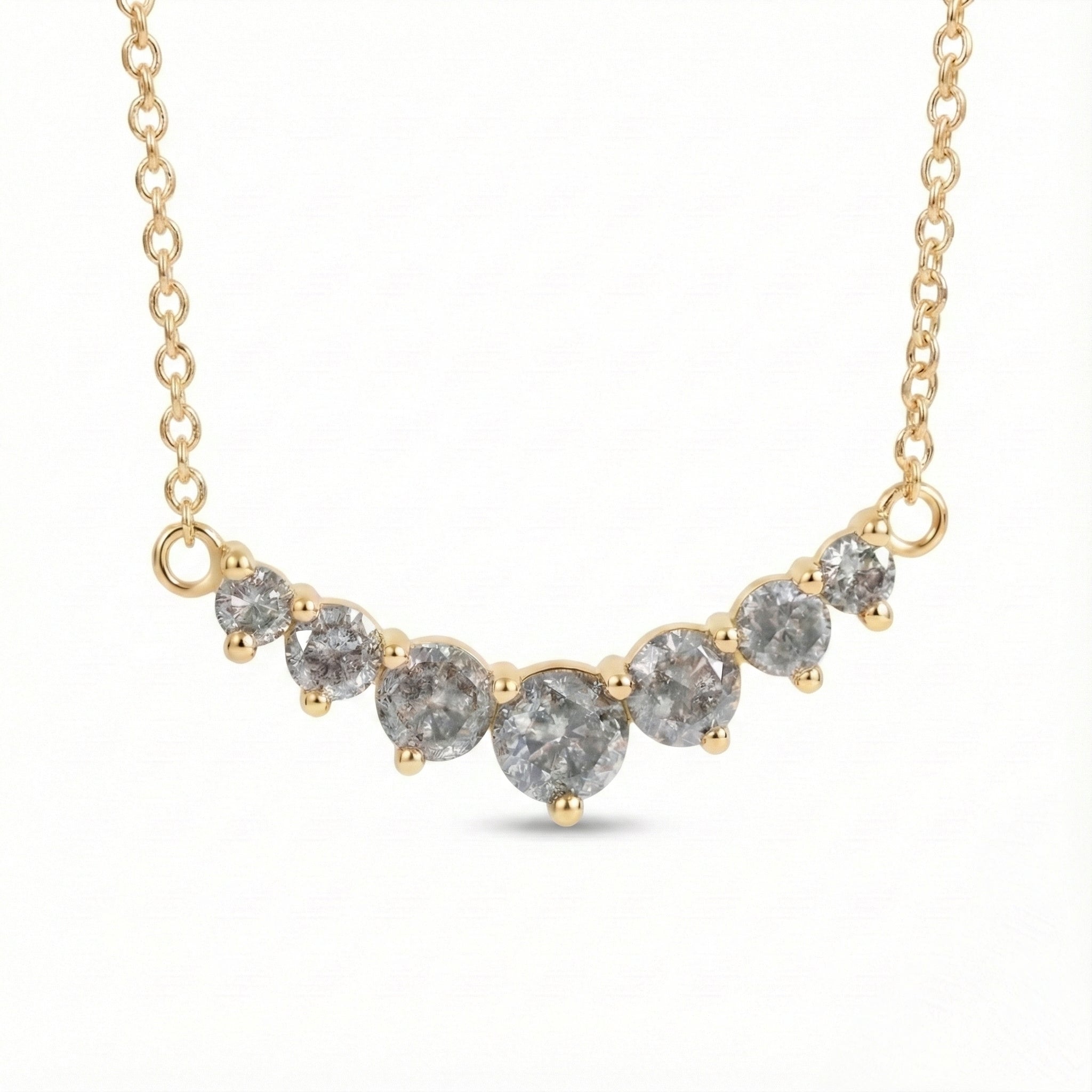 14k yellow gold salt and pepper diamond necklace in a curved 7 stone setting pendant with natural grey diamonds la more design jewelry
