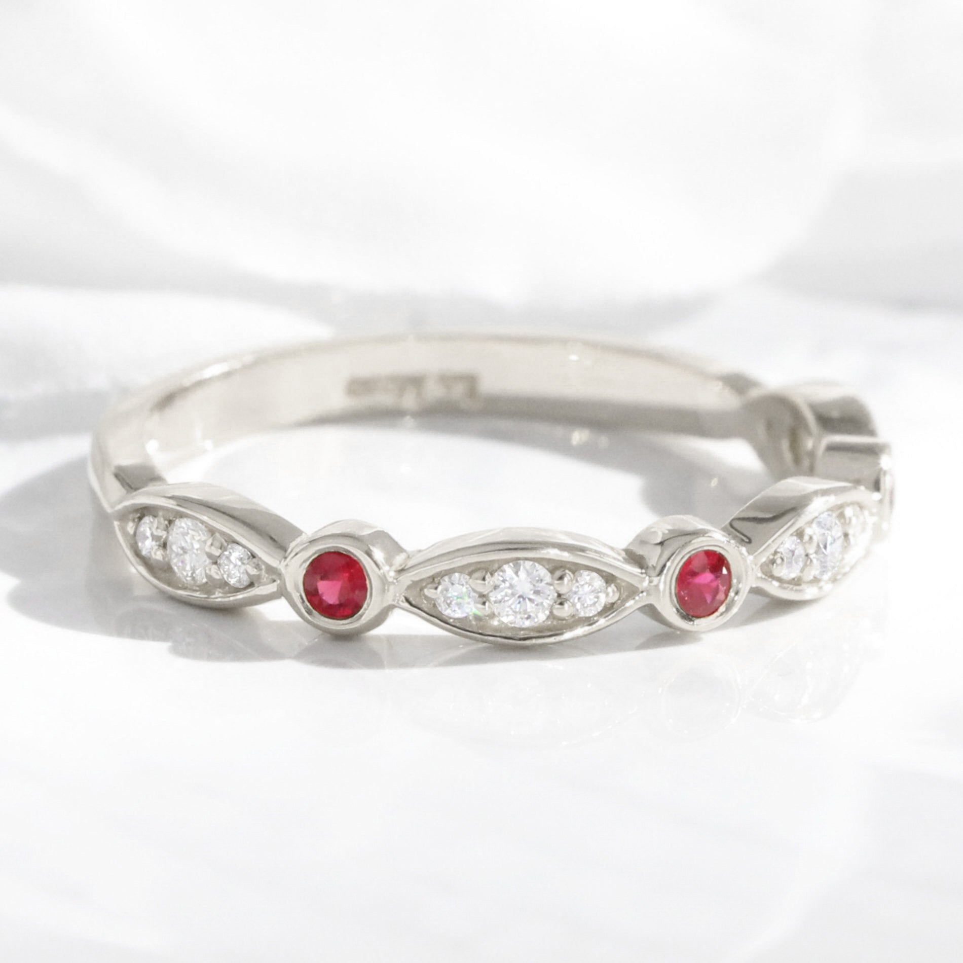 Diamond and Ruby Wedding Band in Rose Gold Bezel Half Eternity