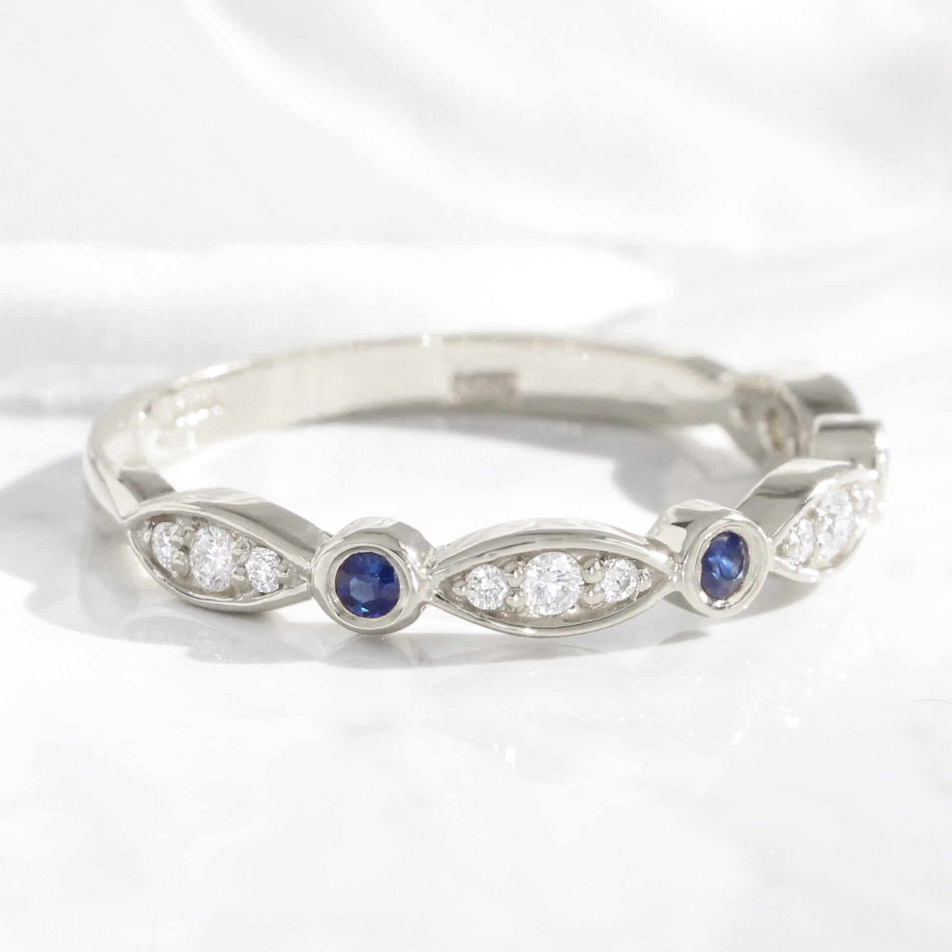 Bezel diamond and sapphire wedding ring white gold scalloped half eternity band la more design jewelry