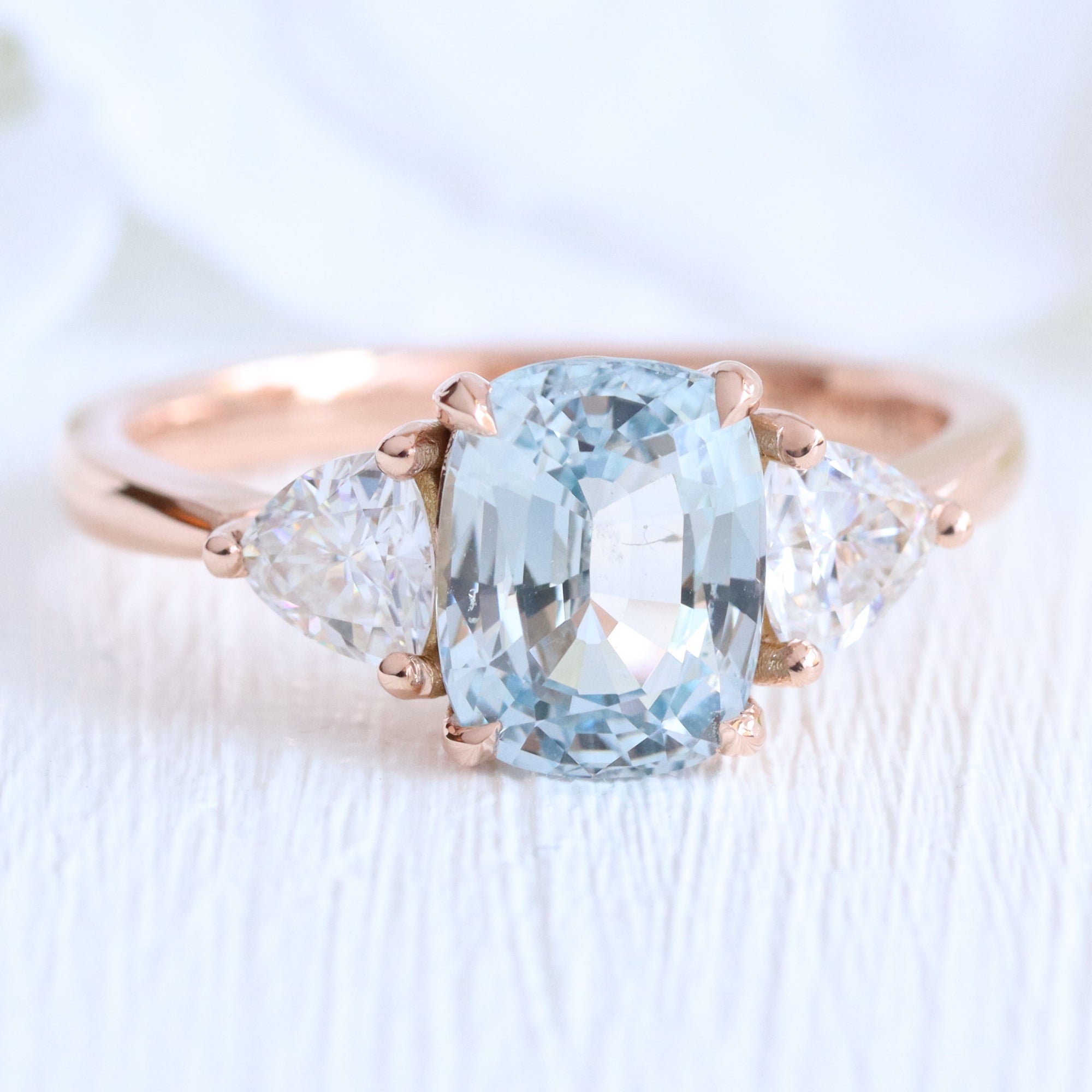 Cushion aqua blue sapphire ring rose gold 3 stone diamond ring la more design jewelry