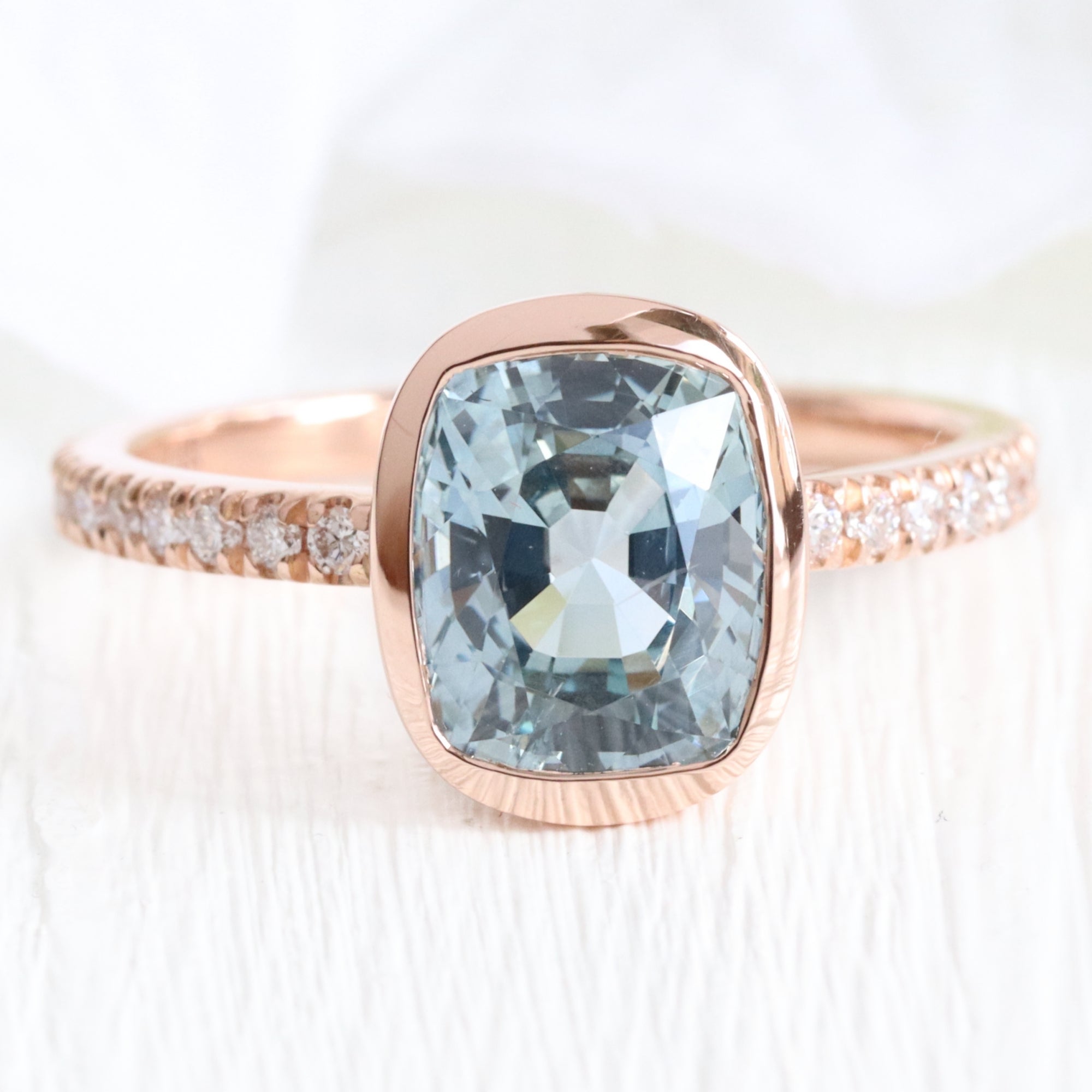 Cushion aqua blue sapphire ring rose gold bezel solitaire pave diamond band la more design jewelry