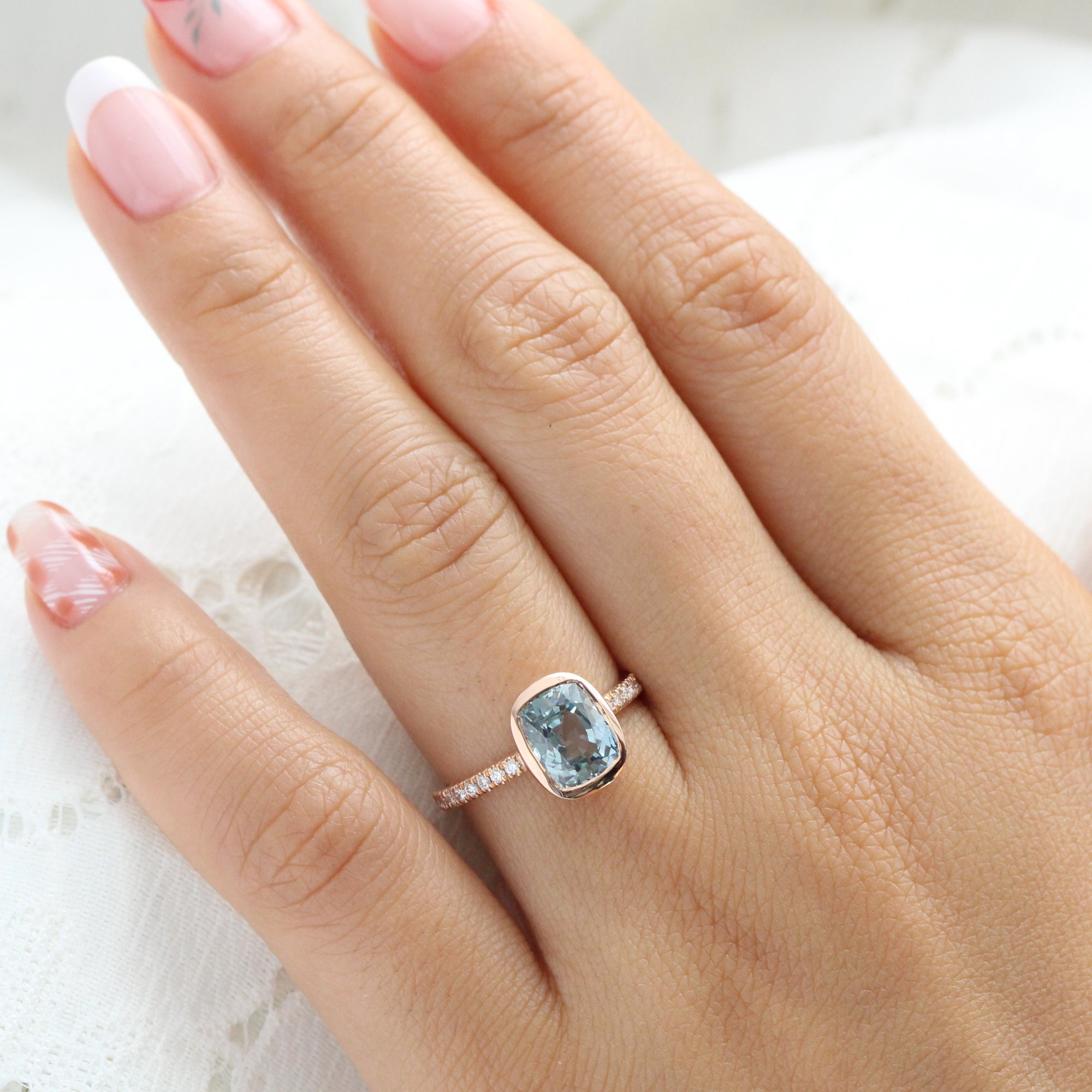 Cushion aqua blue sapphire ring rose gold bezel solitaire pave diamond band la more design jewelry
