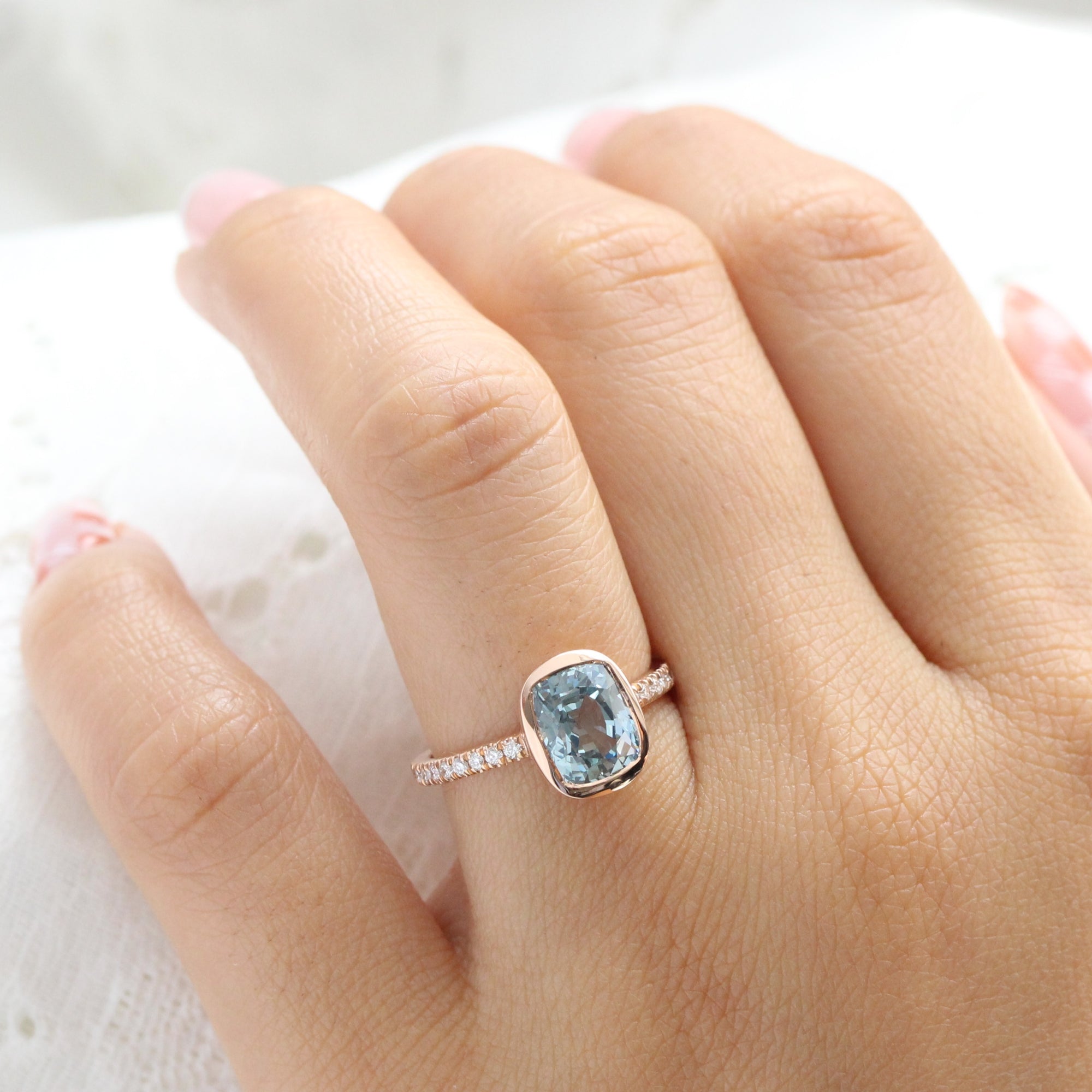 Cushion aqua blue sapphire ring rose gold bezel solitaire pave diamond band la more design jewelry