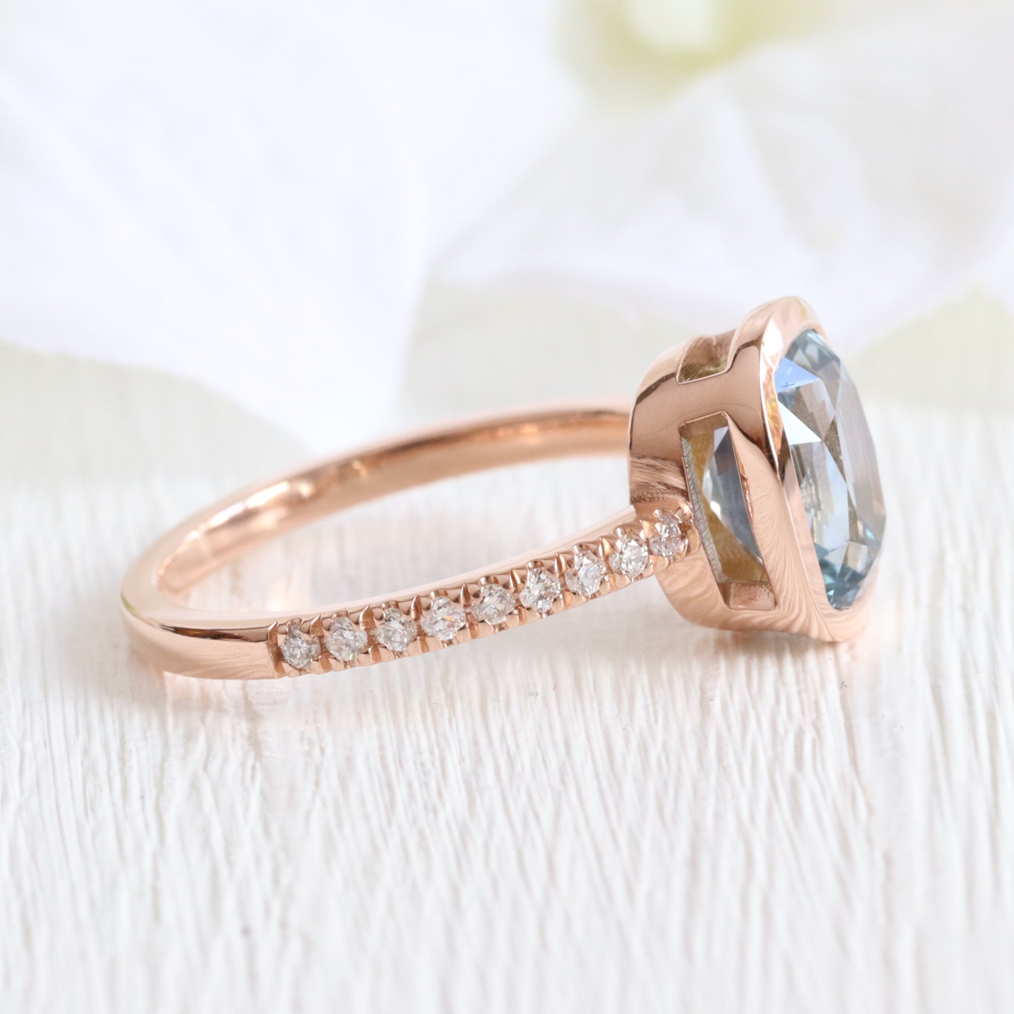 Cushion aqua blue sapphire ring rose gold bezel solitaire pave diamond band la more design jewelry