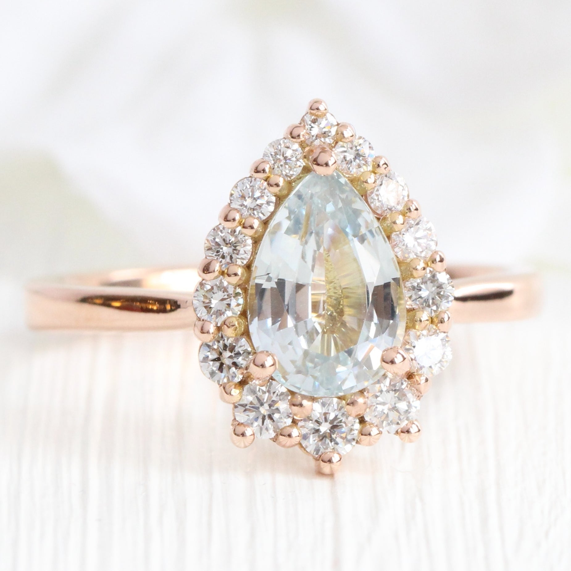 Halo diamond light aqua blue sapphire ring rose gold pear sapphire ring la more design jewelry