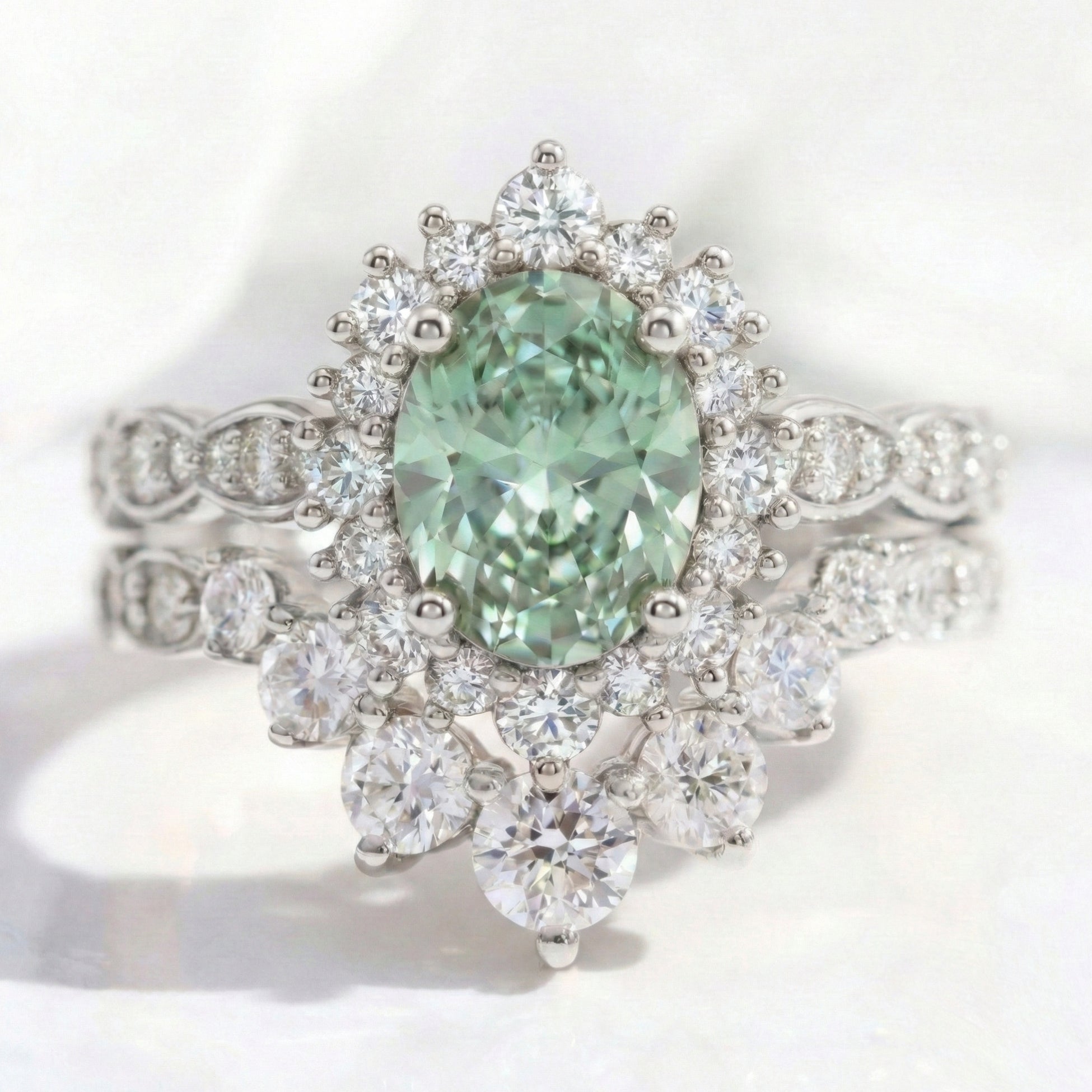 Halo diamond oval green sapphire ring bridal set white gold deep curved diamond wedding band stack la more design jewelry
