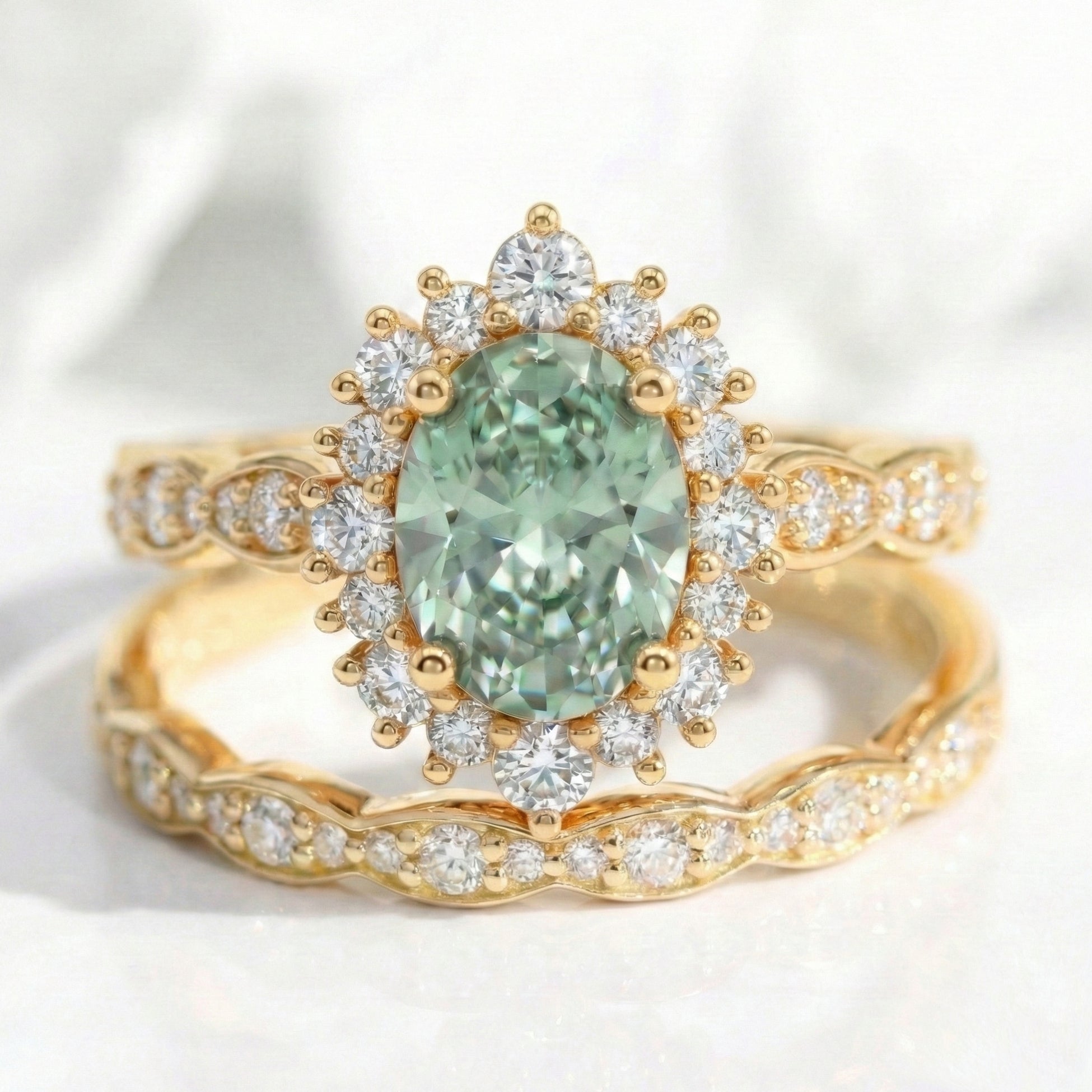 Halo diamond oval green sapphire ring bridal set yellow gold matching diamond wedding band stack la more design jewelry