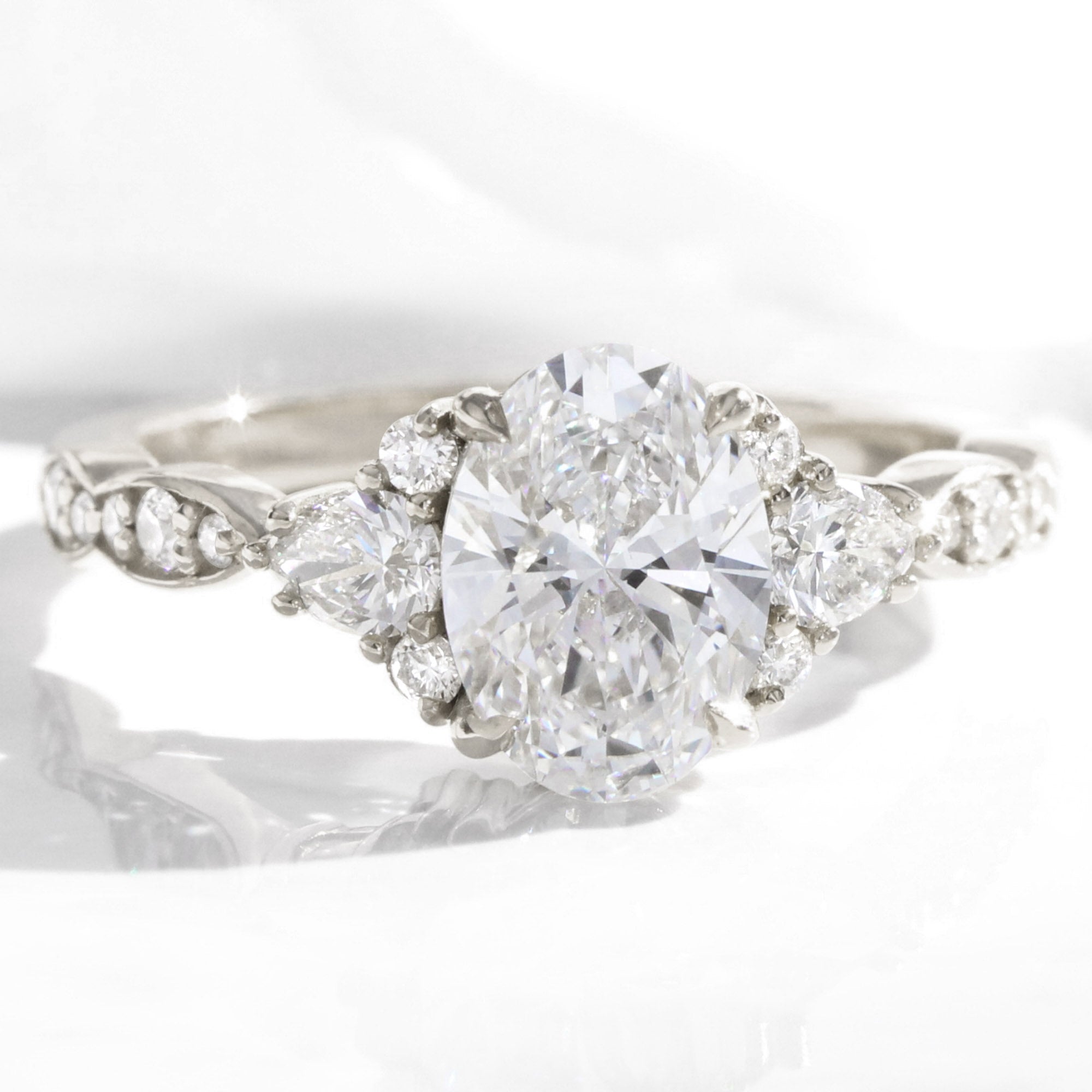 Large lab grown diamond 3 stone engagement ring white gold cluster oval diamond ring la more design jewelry