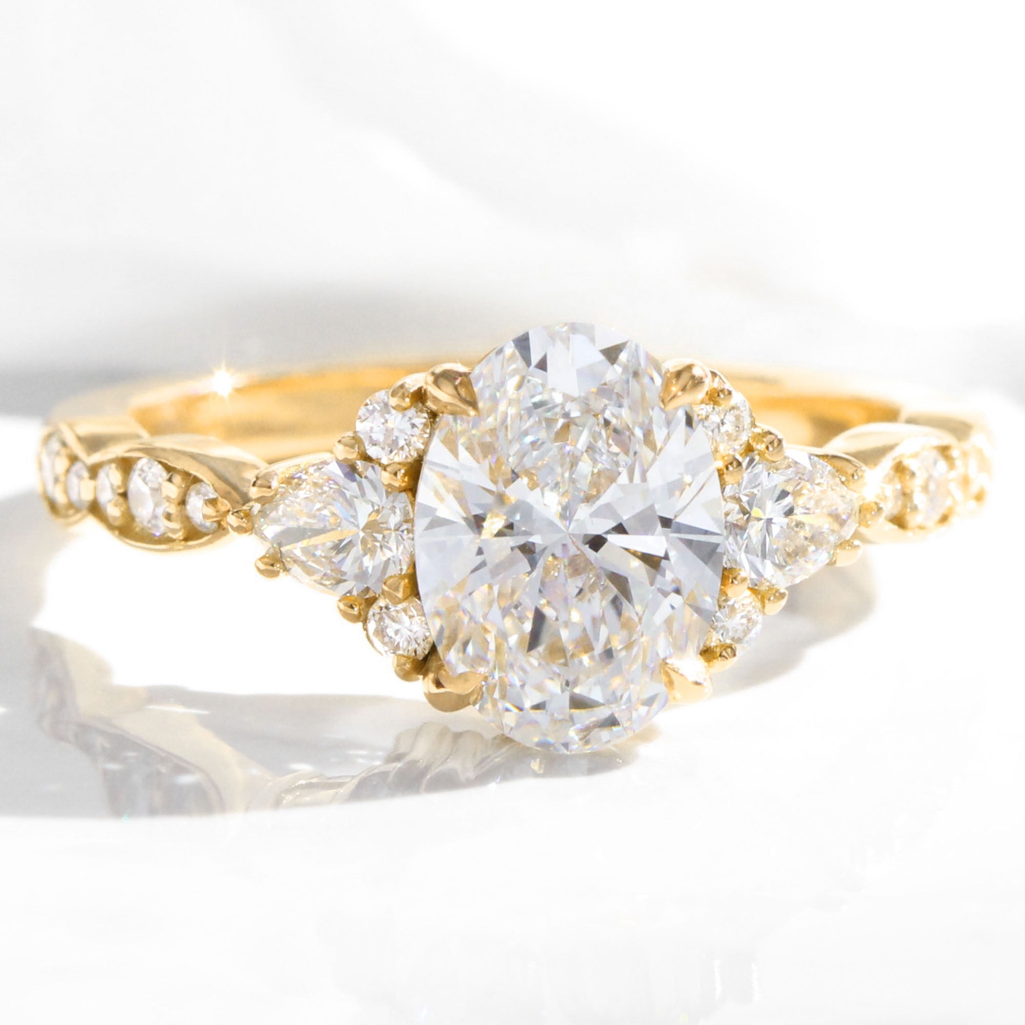 Large lab grown diamond 3 stone engagement ring yellow gold cluster oval diamond ring la more design jewelry