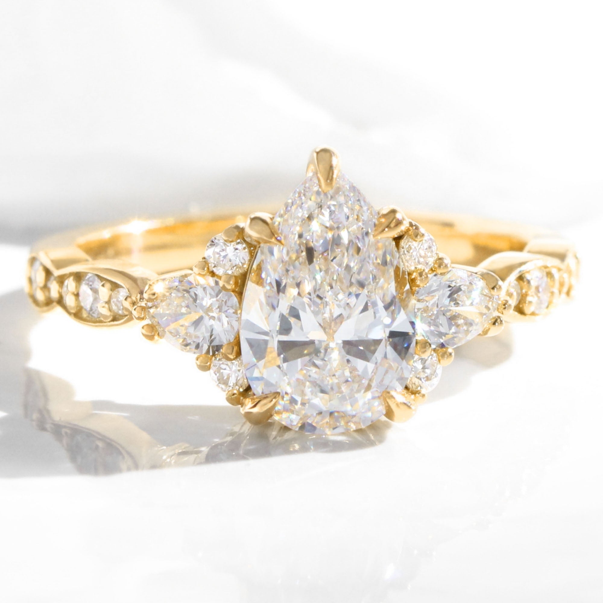 Large lab grown diamond 3 stone engagement ring yellow gold cluster pear diamond ring la more design jewelry