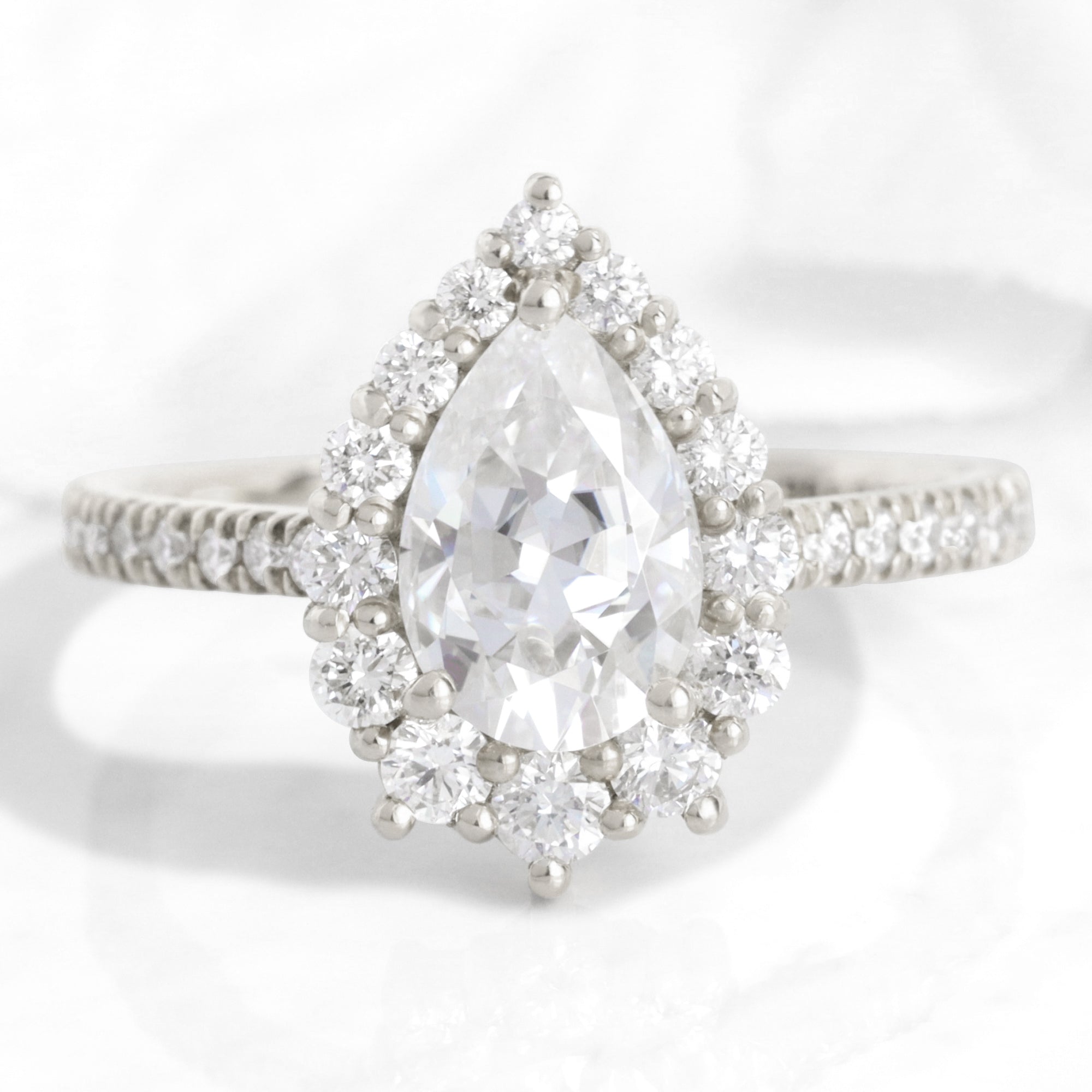 Pear Moissanite Engagement Ring in Tiara Halo Diamond Pave Band