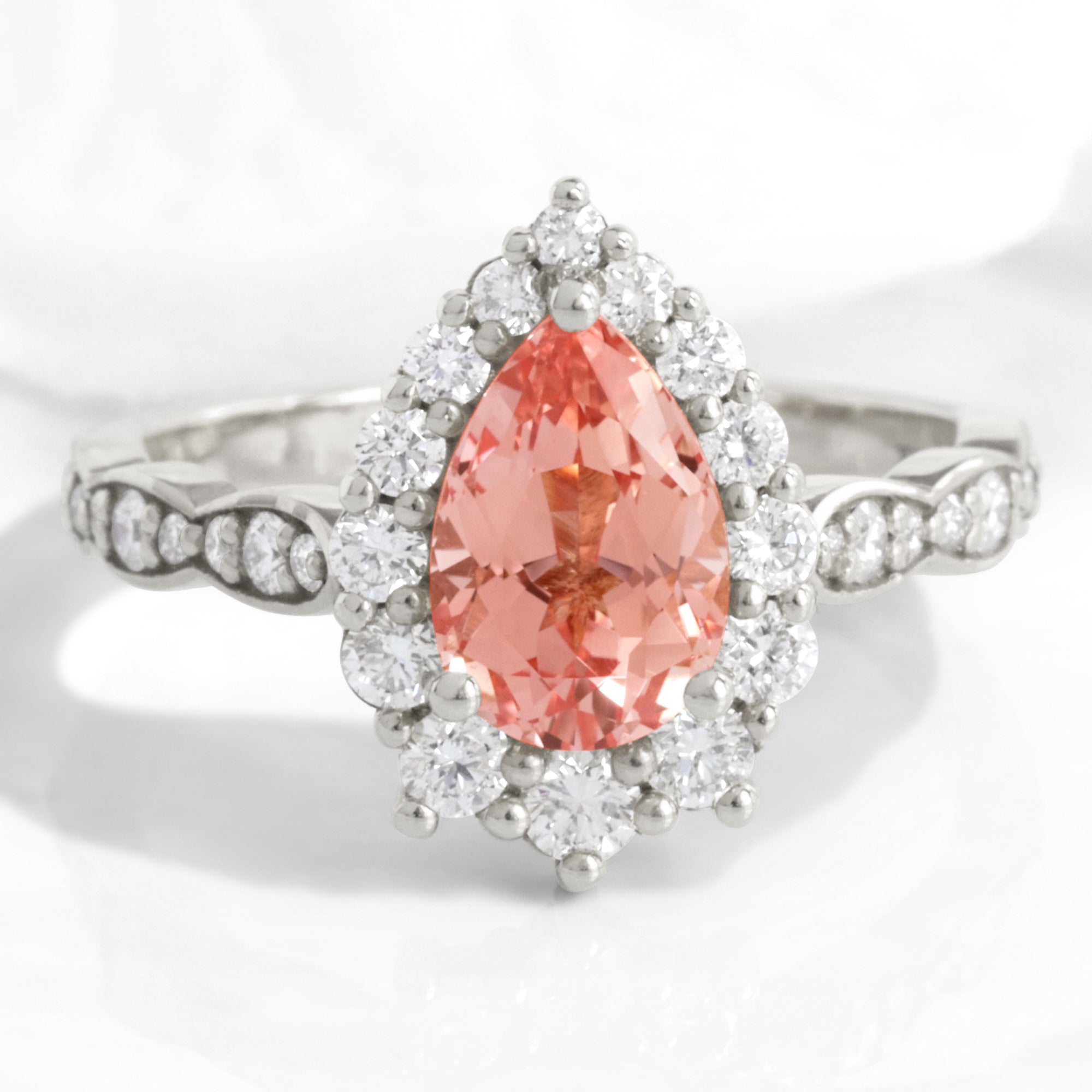 Large pear pink sapphire ring white gold halo diamond peach sapphire engagement ring la more design jewelry