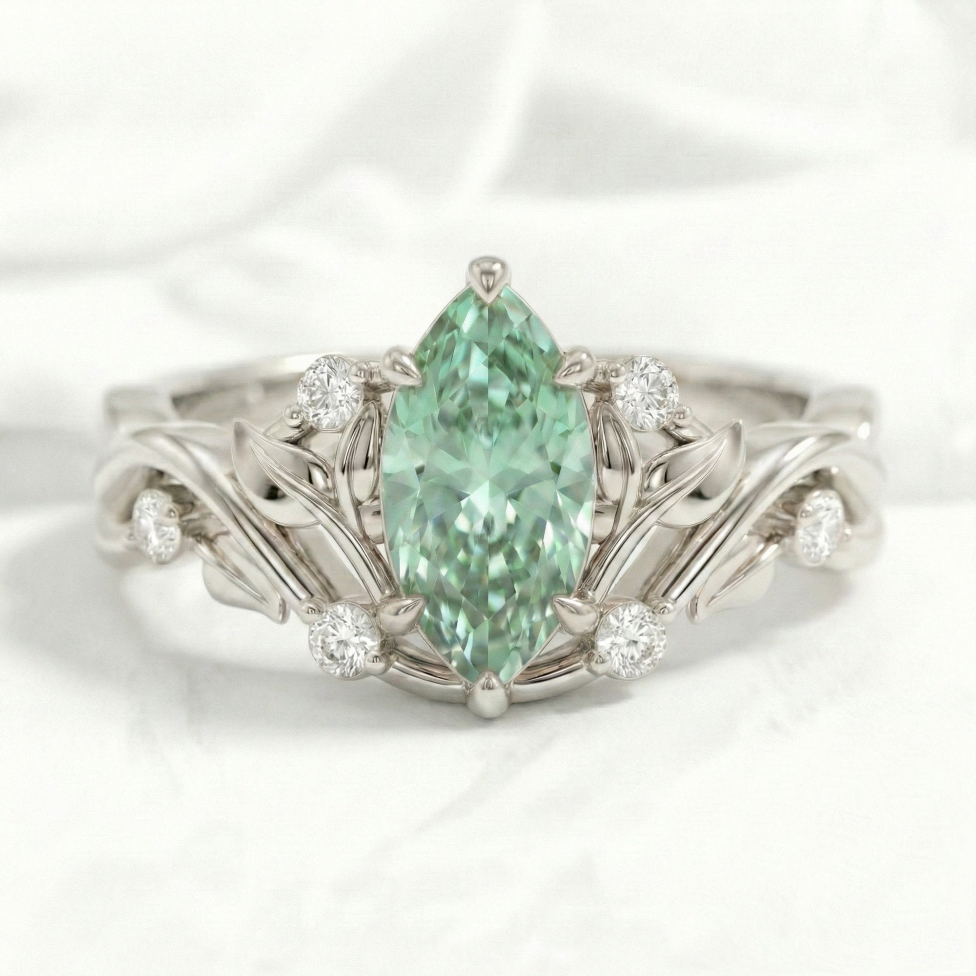 Marquise green sapphire engagement ring white gold floral leaf diamond band la more design jewelry