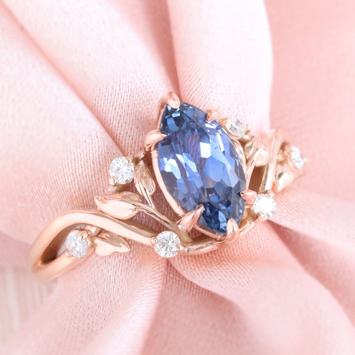 Marquise teal blue sapphire ring rose gold floral leaf diamond sapphire solitaire ring la more design jewelry
