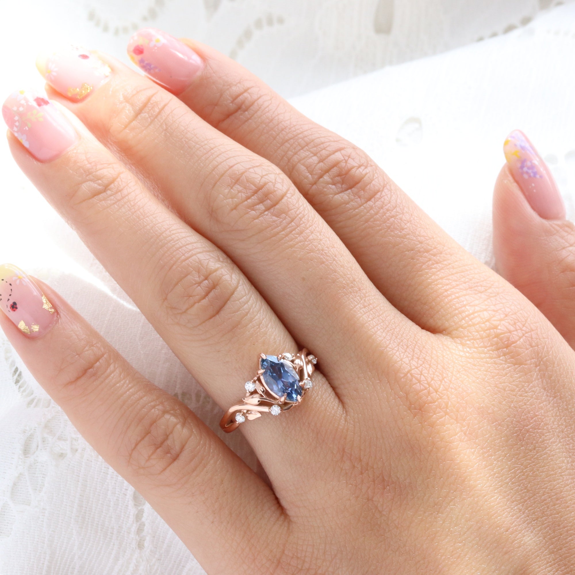 Marquise teal blue sapphire ring rose gold floral leaf diamond sapphire solitaire ring la more design jewelry
