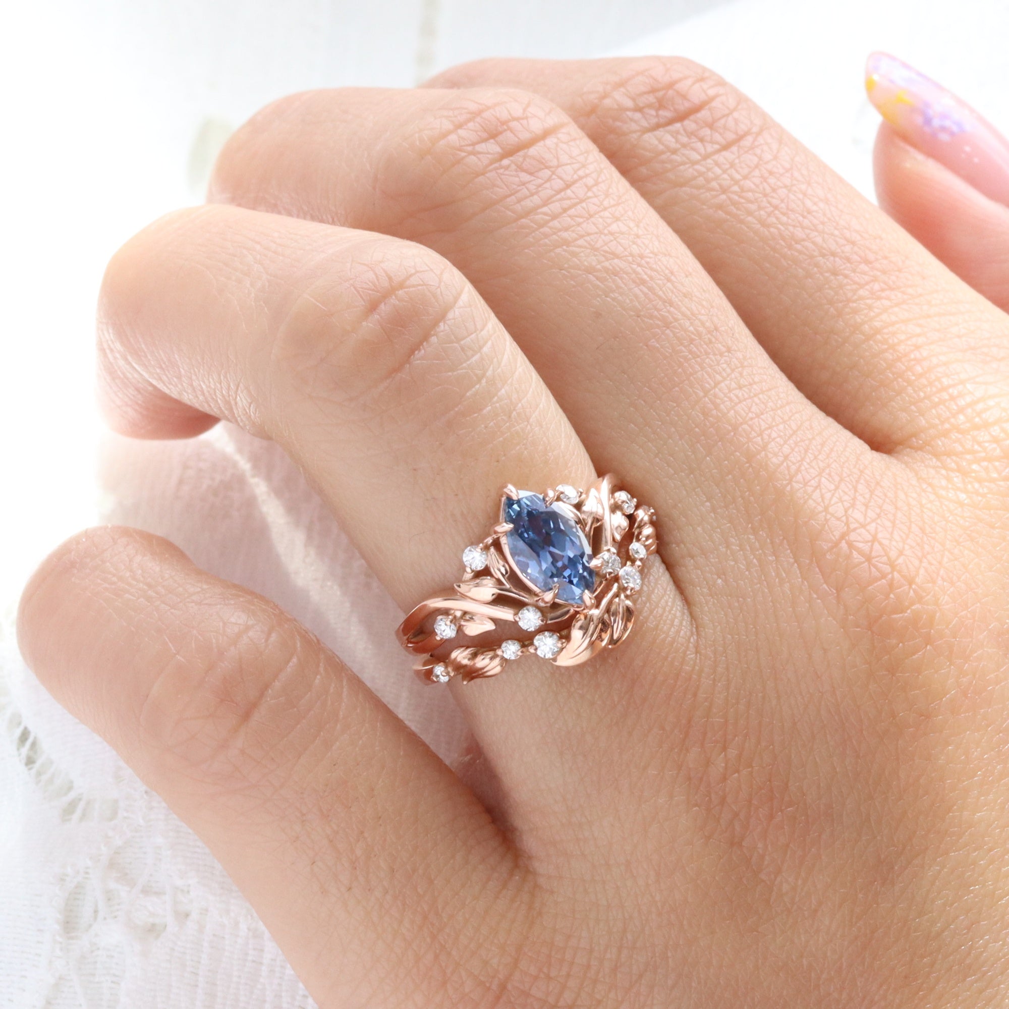 Marquise teal blue sapphire ring rose gold floral leaf diamond sapphire solitaire ring la more design jewelry
