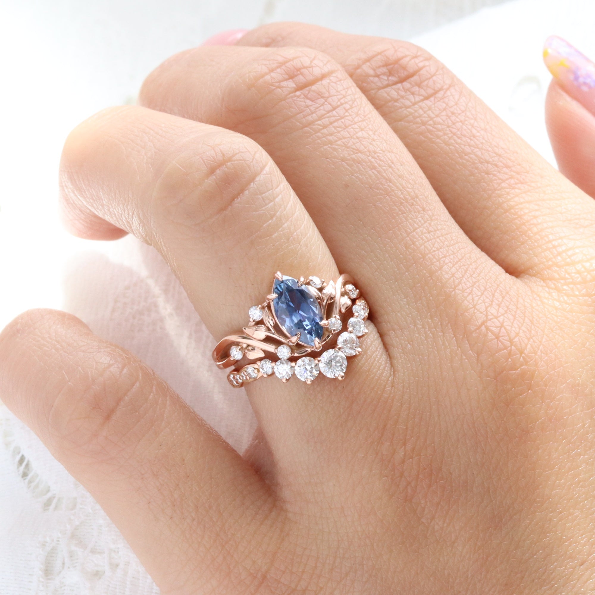 Marquise teal blue sapphire ring rose gold floral leaf diamond sapphire solitaire ring la more design jewelry
