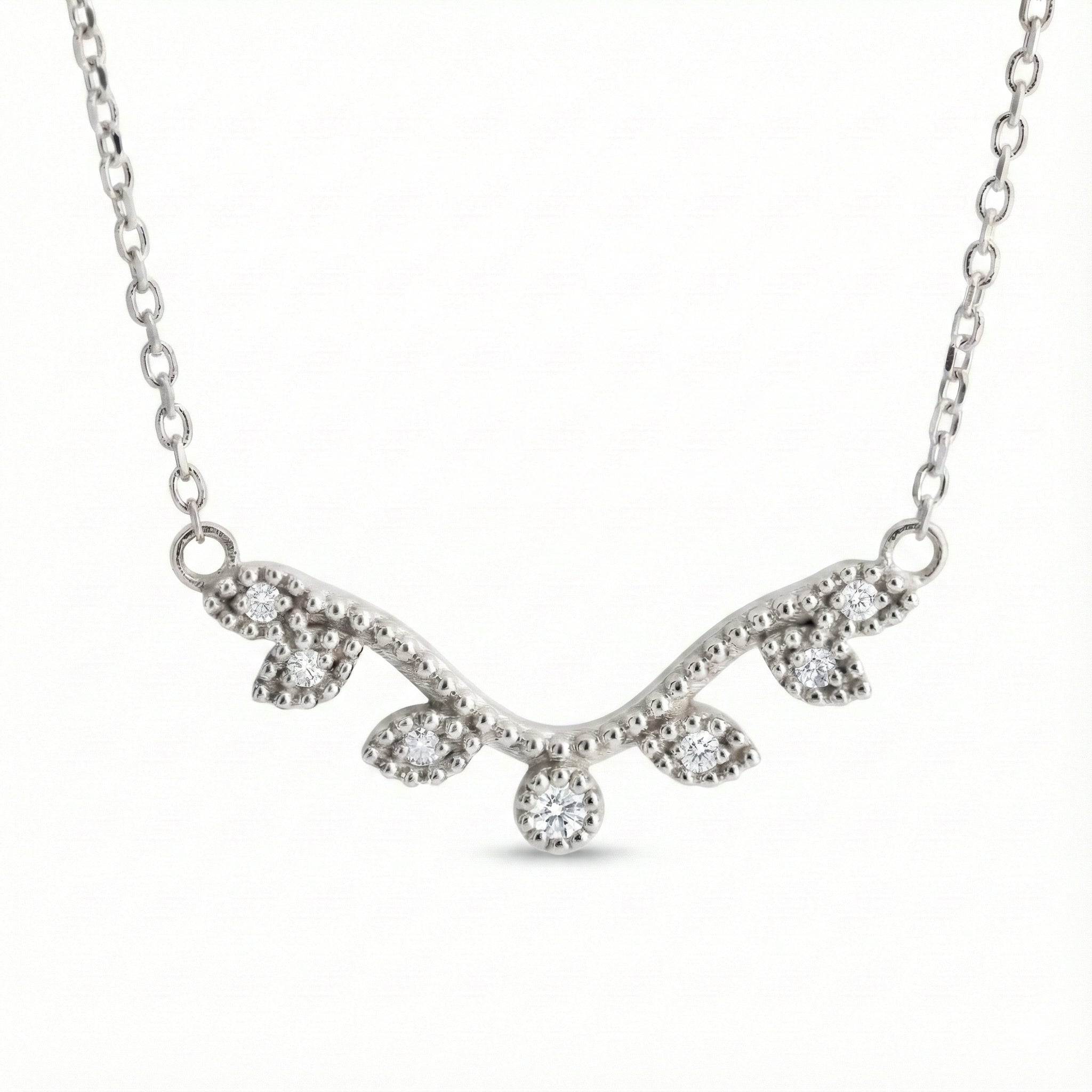 Natural inspired leaf diamond necklace white gold curved pendant gold chain La More Design Jewelry