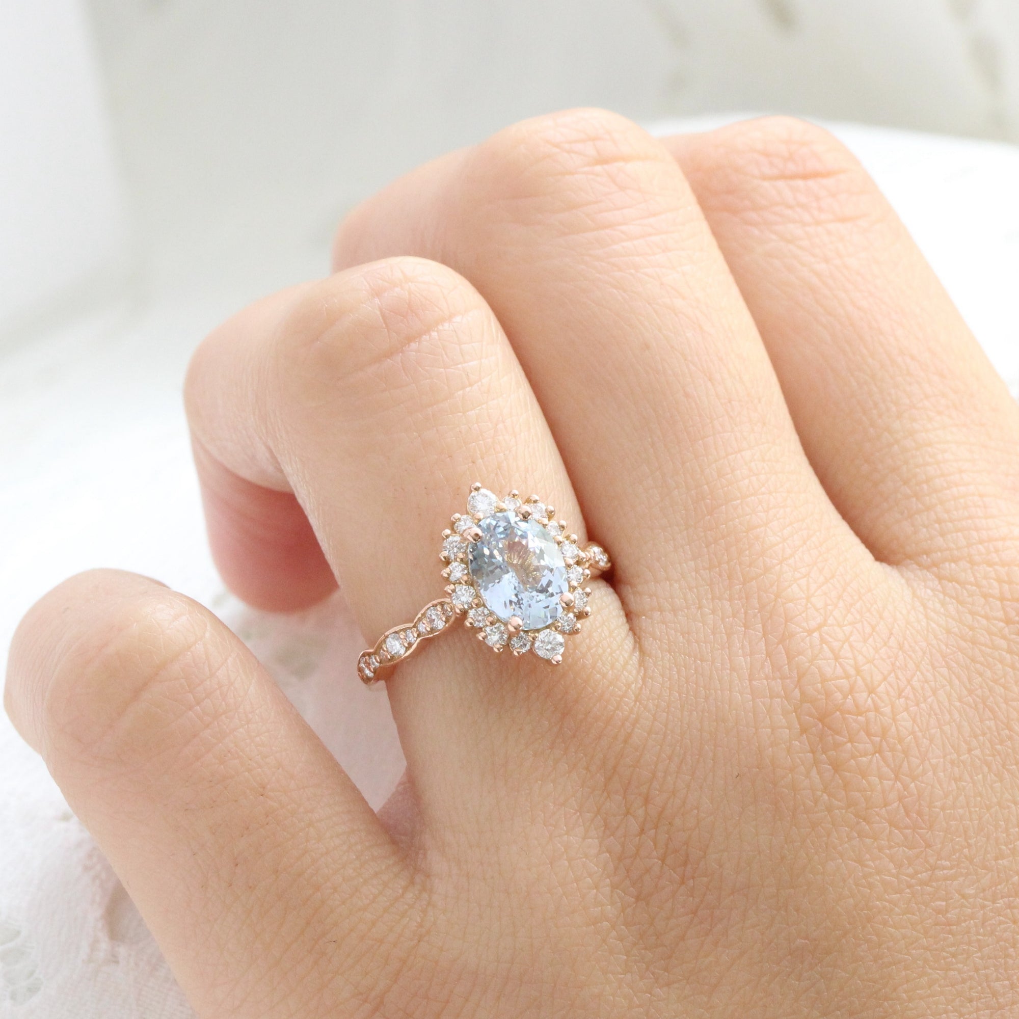 Oval aqua blue sapphire ring rose gold halo diamond sapphire engagement ring la more design jewelry