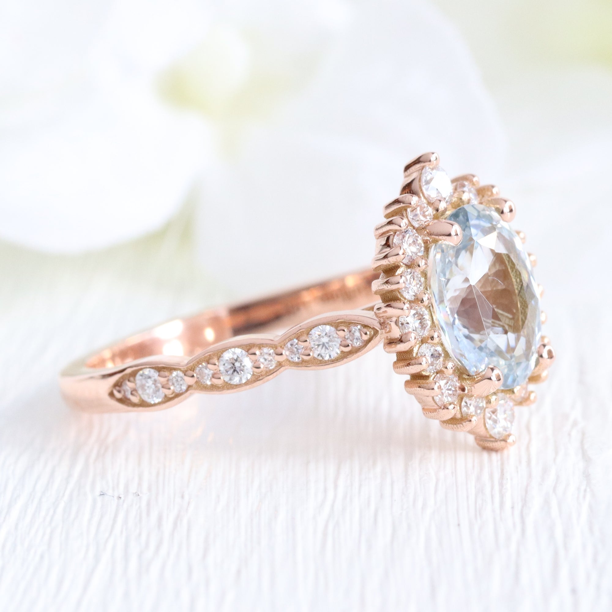 Oval aqua blue sapphire ring rose gold halo diamond sapphire engagement ring la more design jewelry