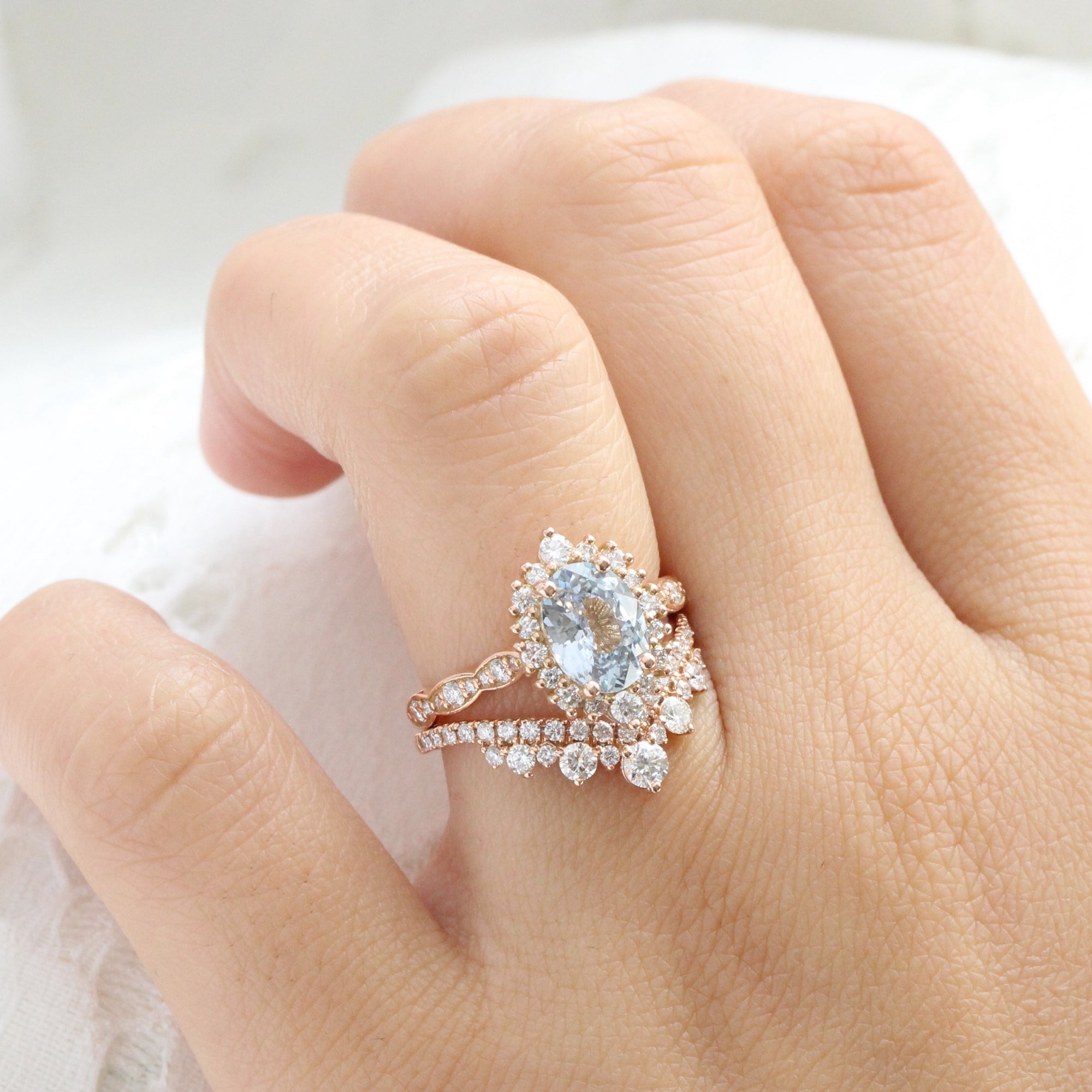 Oval aqua blue sapphire ring rose gold halo diamond sapphire engagement ring la more design jewelry