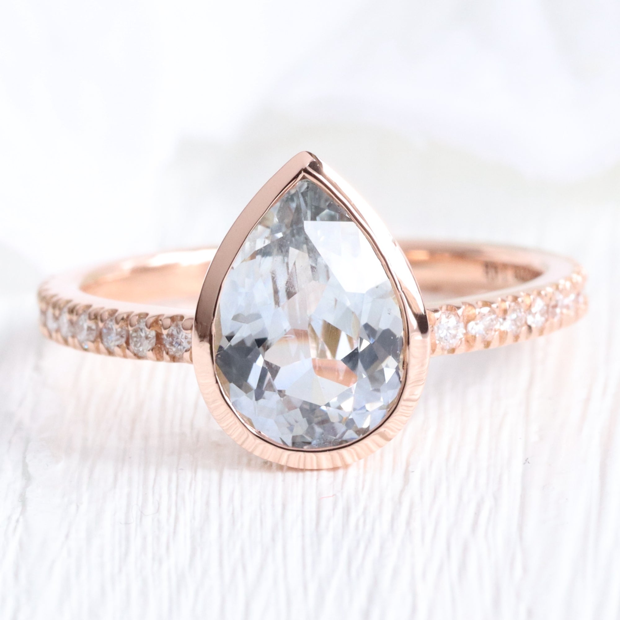Pear aqua blue sapphire ring rose gold bezel solitaire pave diamond band la more design jewelry